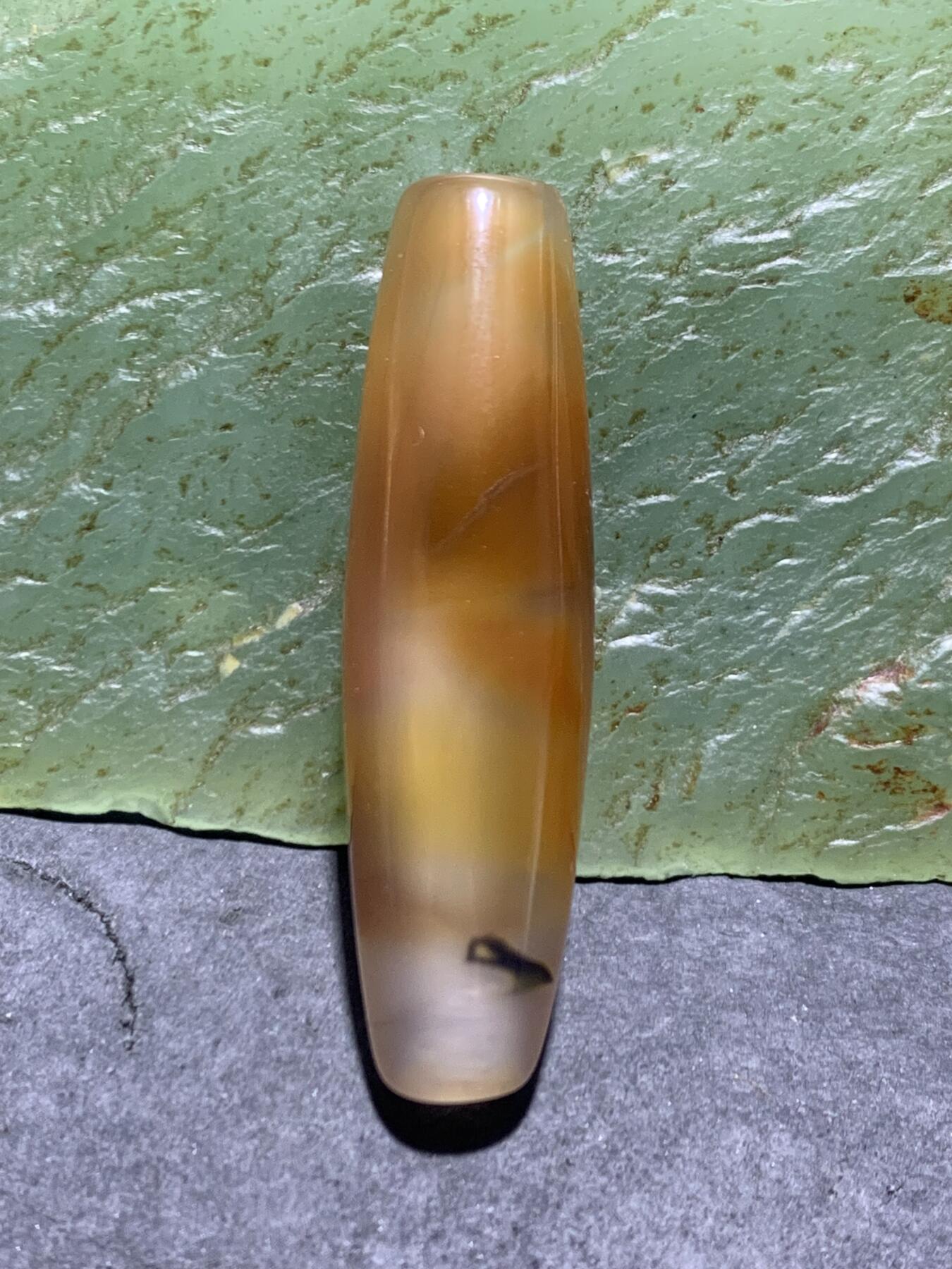 高玉化冻料巴西玛瑙通货桶珠一颗，