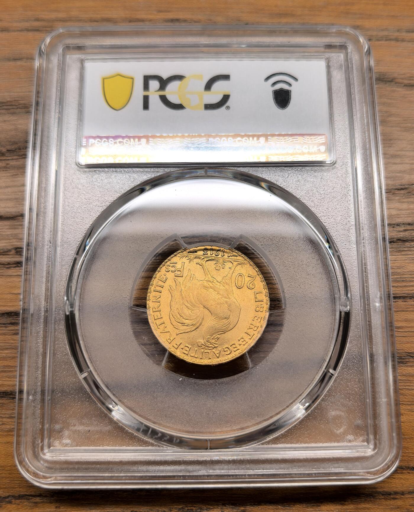 凡希社世界钱币微拍第三百零二期 1913法国自由帽女神20法郎金币PCGS-MS65，6.45g，900金。
