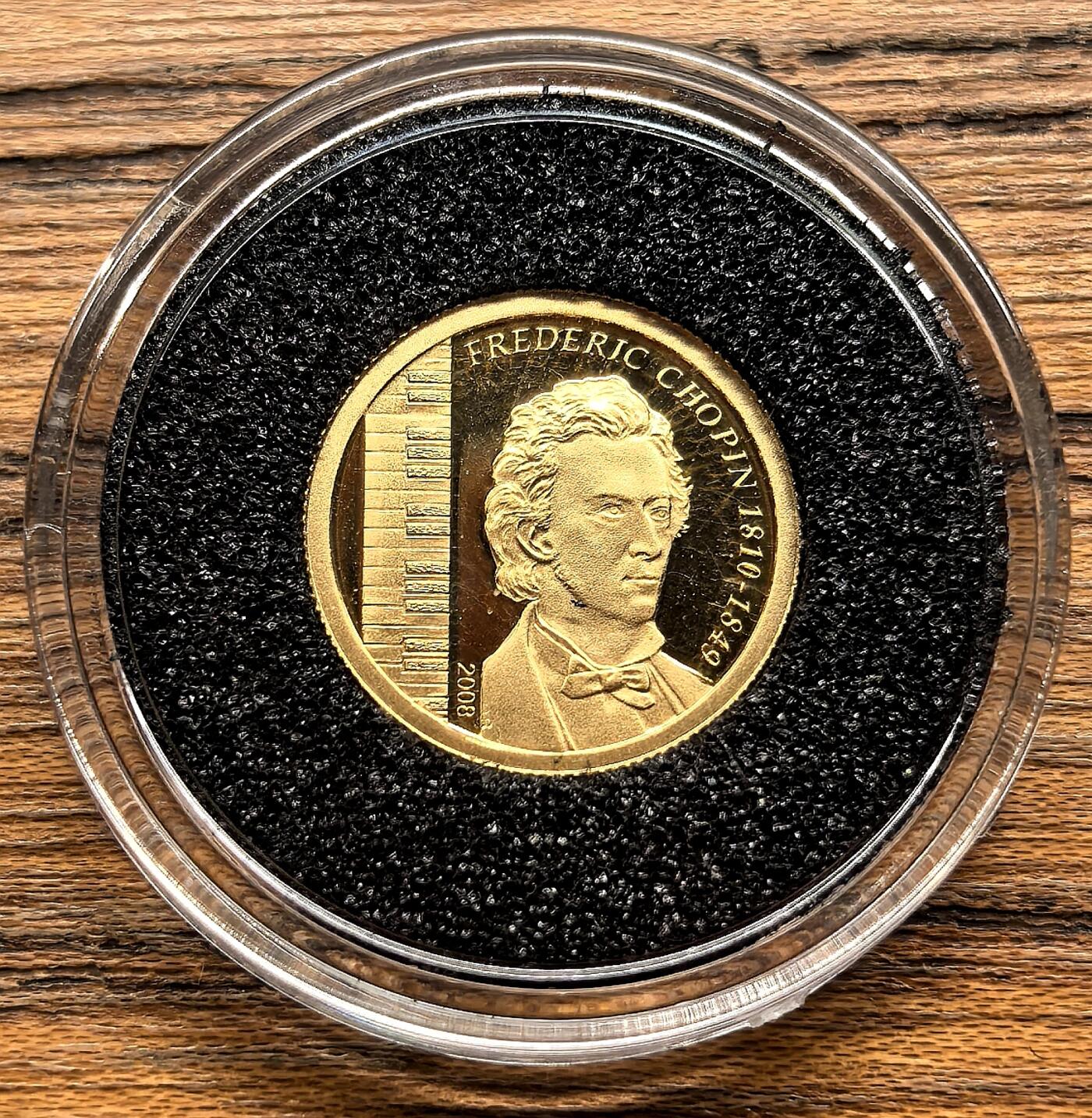 凡希社世界钱币微拍第三百零二期 200月蒙古国肖邦纪念1000T小金币全品，1.24g，999金。