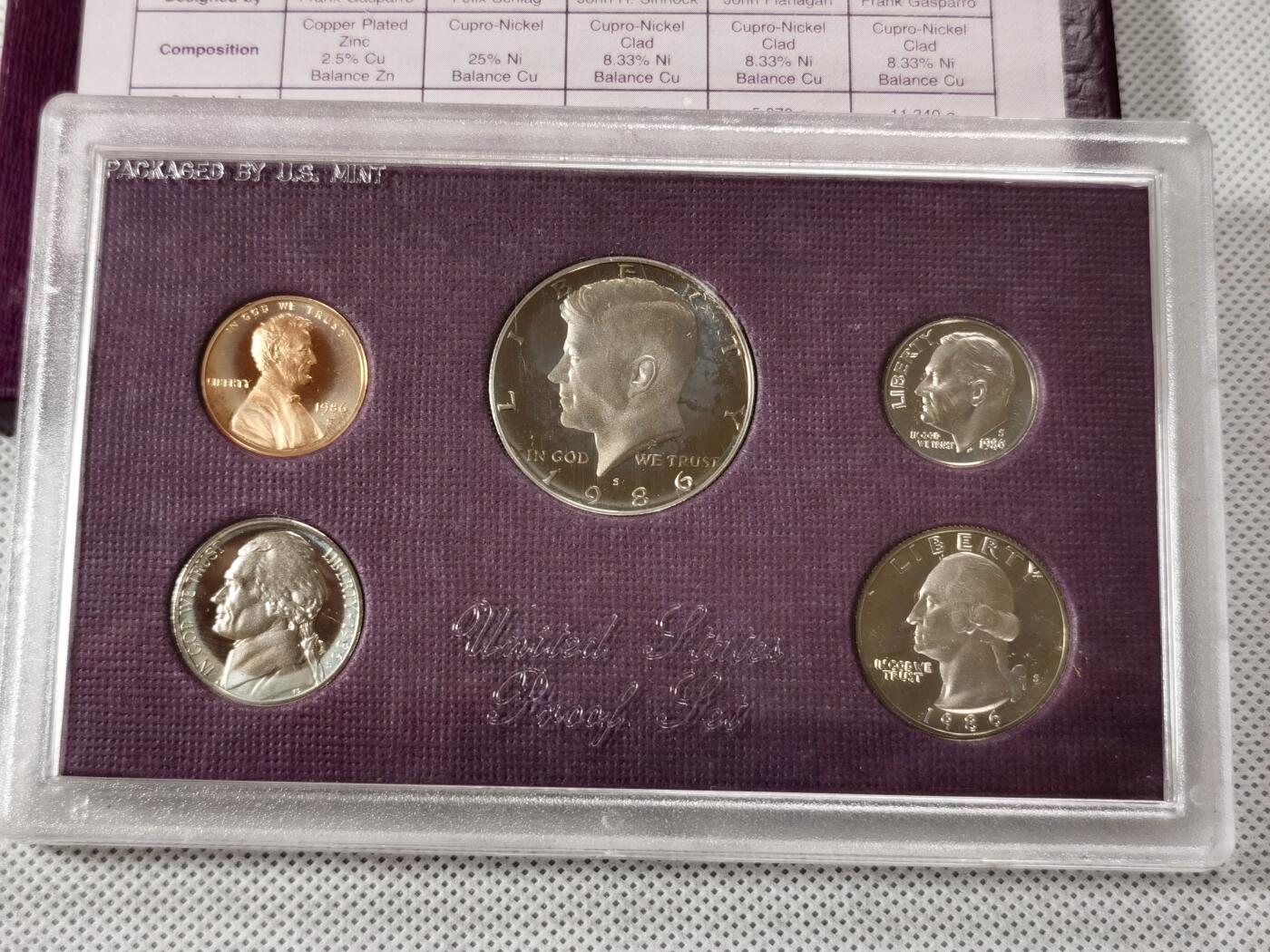  甄臻铺-世界币章拍卖（第15期）套币，现代银币专场。送拍享返佣金等优惠多多 美国1986年盒装精制套币，几乎未氧化