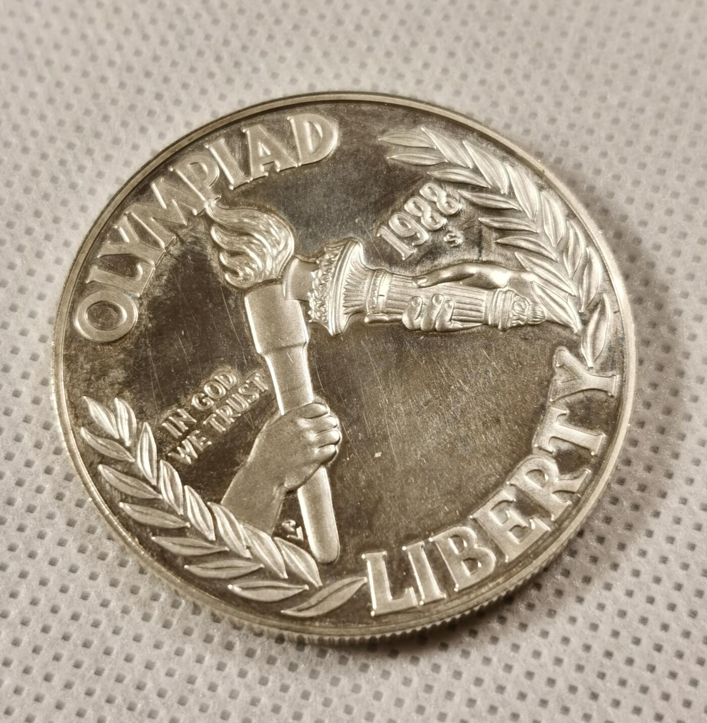  甄臻铺-世界币章拍卖（第15期）套币，现代银币专场。送拍享返佣金等优惠多多 美国1988年汉城奥运会1美元精制银币 26.73克 0.9银