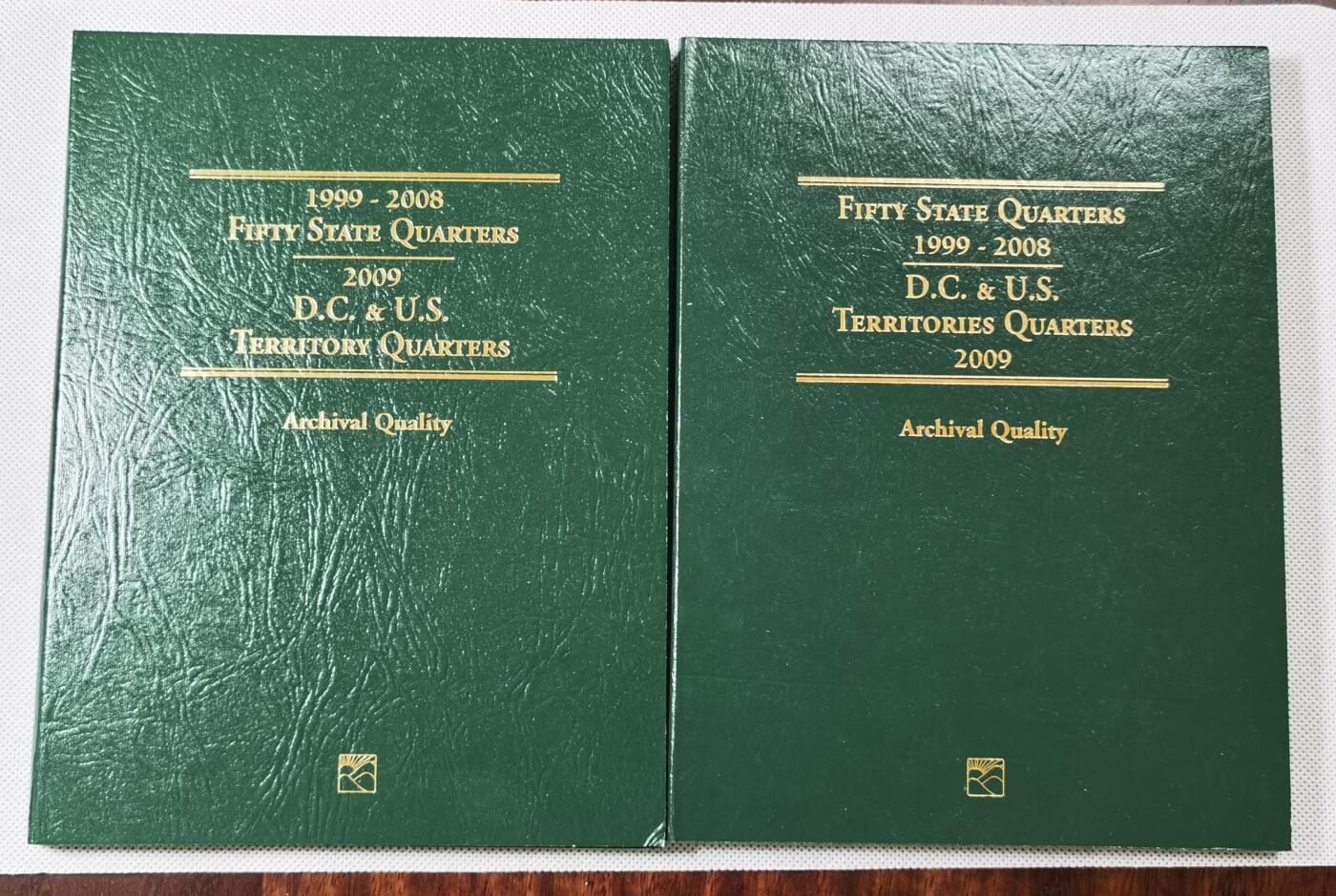  甄臻铺-世界币章拍卖（第15期）套币，现代银币专场。送拍享返佣金等优惠多多 美国50州及海外属地四分之一美元纪念币，56枚全，原光品相（D、P厂）两本一起，两本一共112枚
