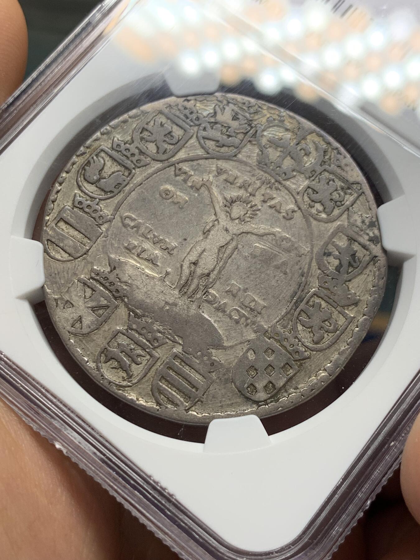 《竞宝斋》第378场 周日，周一 2场连拍 （全场包邮） NGC VF 德国 布伦瑞克-沃尔芬比特尔公国 1597年 泰勒大银币 又名“真理泰勒 ”这枚塔勒指的是公爵与一些贵族阶层之间的纠纷。海因里希·尤利乌斯希望通过这枚硬币表达，尽管他感到被原告诽谤，但真理最终会胜利。（意为：“行善无畏”）