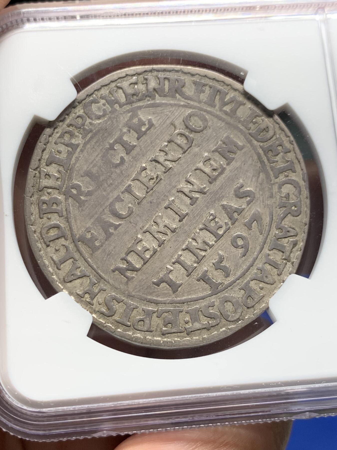 《竞宝斋》第378场 周日，周一 2场连拍 （全场包邮） NGC VF 德国 布伦瑞克-沃尔芬比特尔公国 1597年 泰勒大银币 又名“真理泰勒 ”这枚塔勒指的是公爵与一些贵族阶层之间的纠纷。海因里希·尤利乌斯希望通过这枚硬币表达，尽管他感到被原告诽谤，但真理最终会胜利。（意为：“行善无畏”）