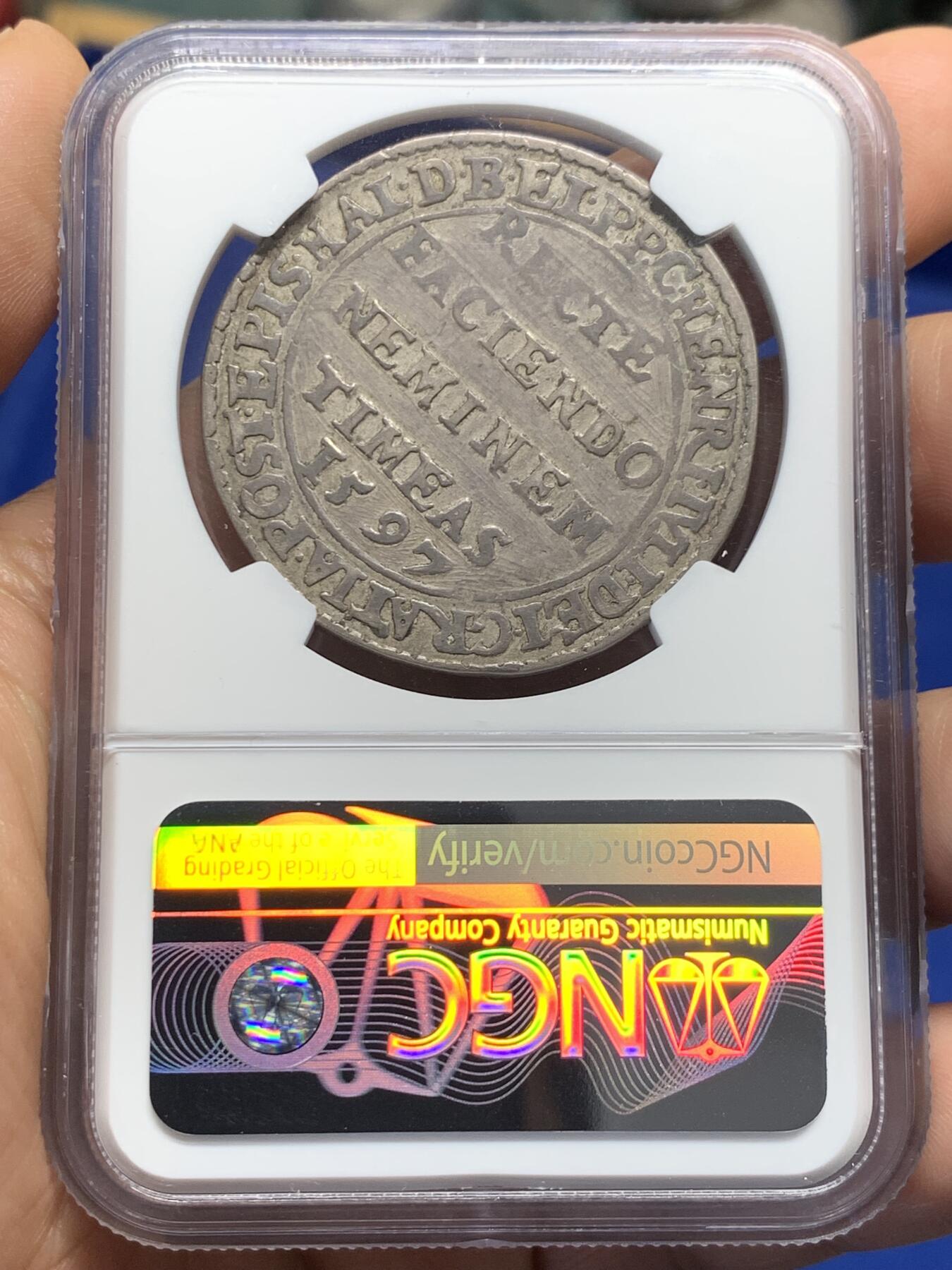 《竞宝斋》第378场 周日，周一 2场连拍 （全场包邮） NGC VF 德国 布伦瑞克-沃尔芬比特尔公国 1597年 泰勒大银币 又名“真理泰勒 ”这枚塔勒指的是公爵与一些贵族阶层之间的纠纷。海因里希·尤利乌斯希望通过这枚硬币表达，尽管他感到被原告诽谤，但真理最终会胜利。（意为：“行善无畏”）