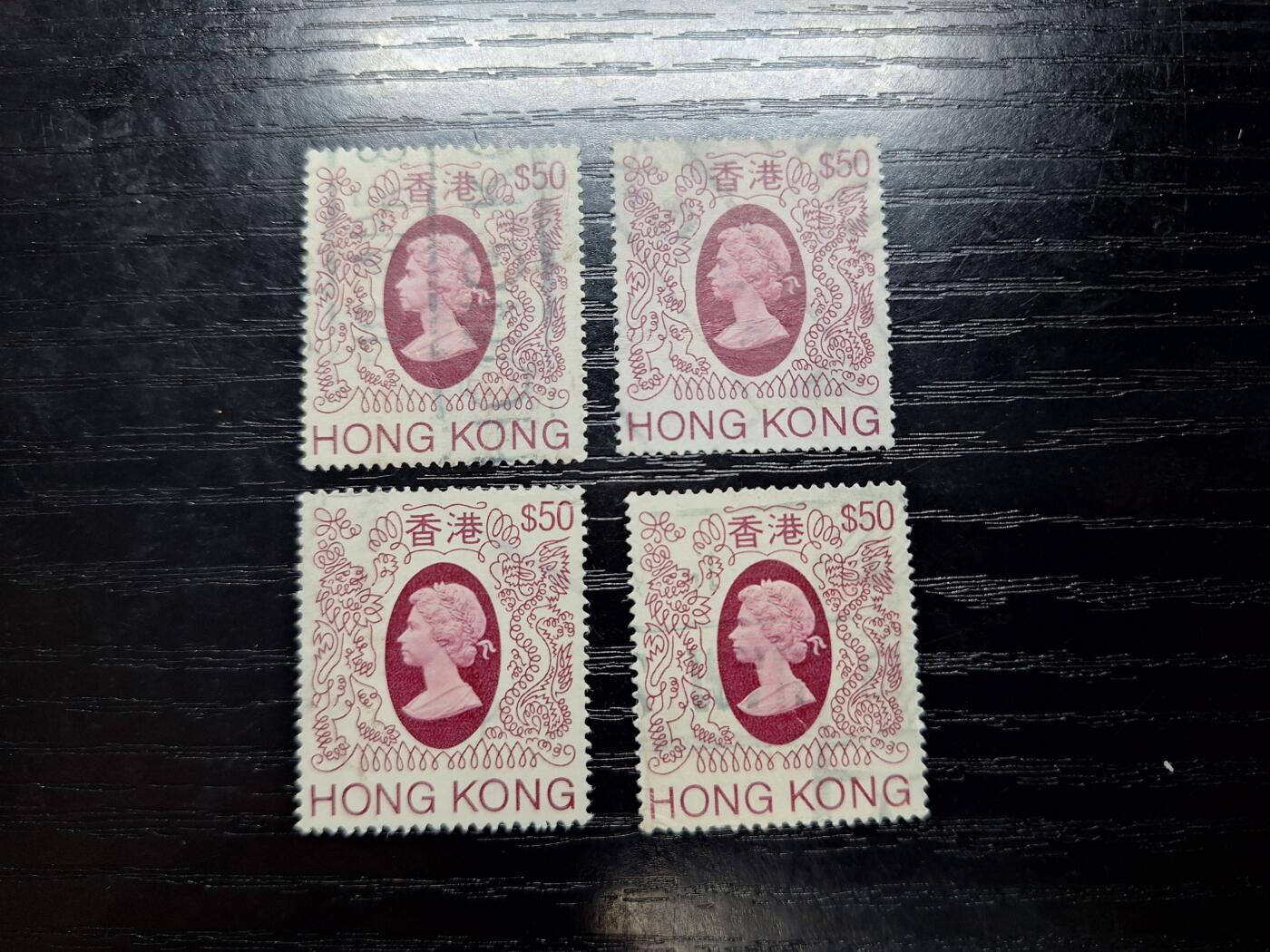 HKPNC 博彦收藏 5月10日 8点港澳邮票专场 香港女皇狮龙50元旧票4枚 一枚有薄其他上品