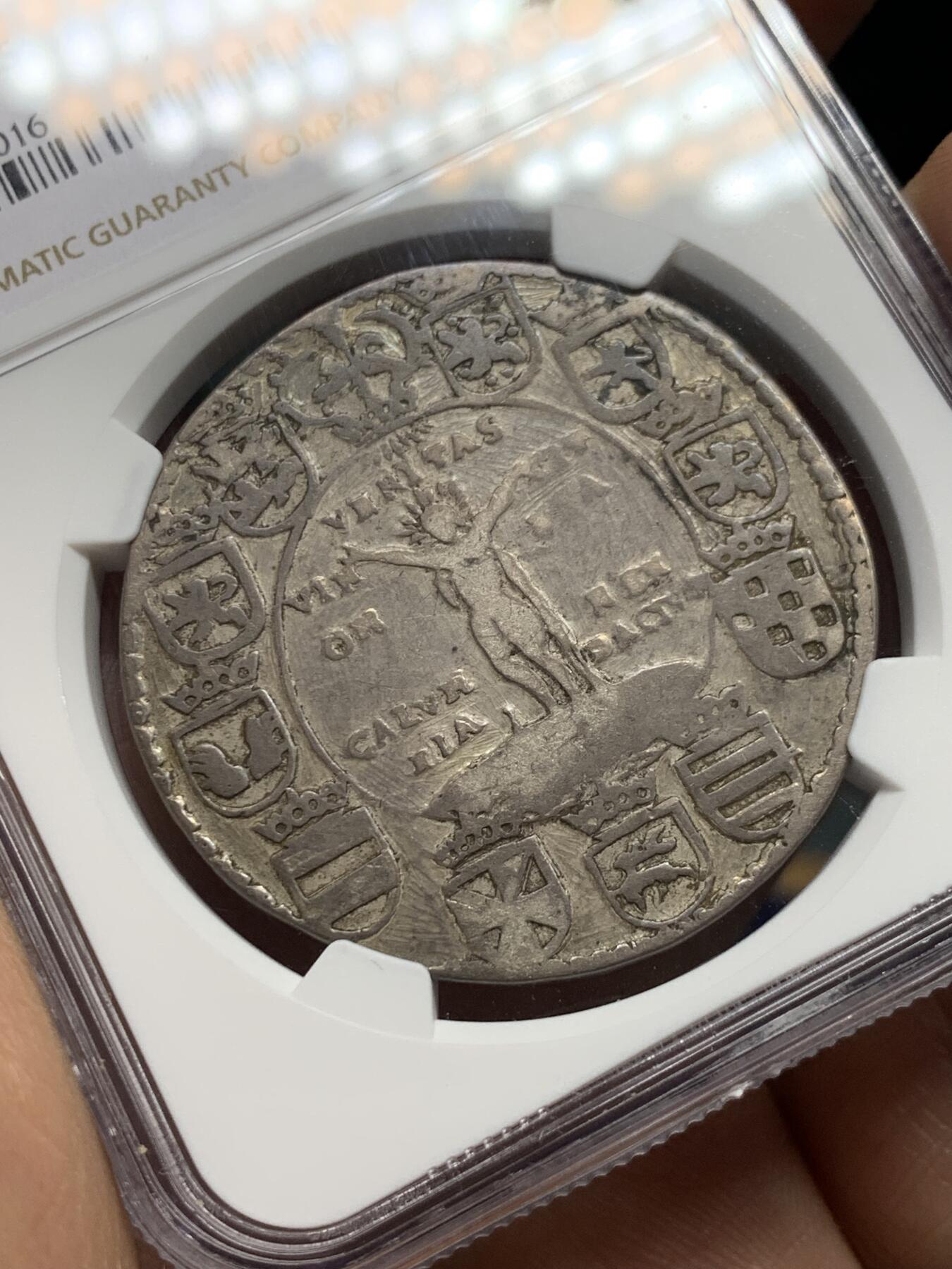 《竞宝斋》第378场 周日，周一 2场连拍 （全场包邮） NGC VF 德国 布伦瑞克-沃尔芬比特尔公国 1597年 泰勒大银币 又名“真理泰勒 ”这枚塔勒指的是公爵与一些贵族阶层之间的纠纷。海因里希·尤利乌斯希望通过这枚硬币表达，尽管他感到被原告诽谤，但真理最终会胜利。（意为：“行善无畏”）