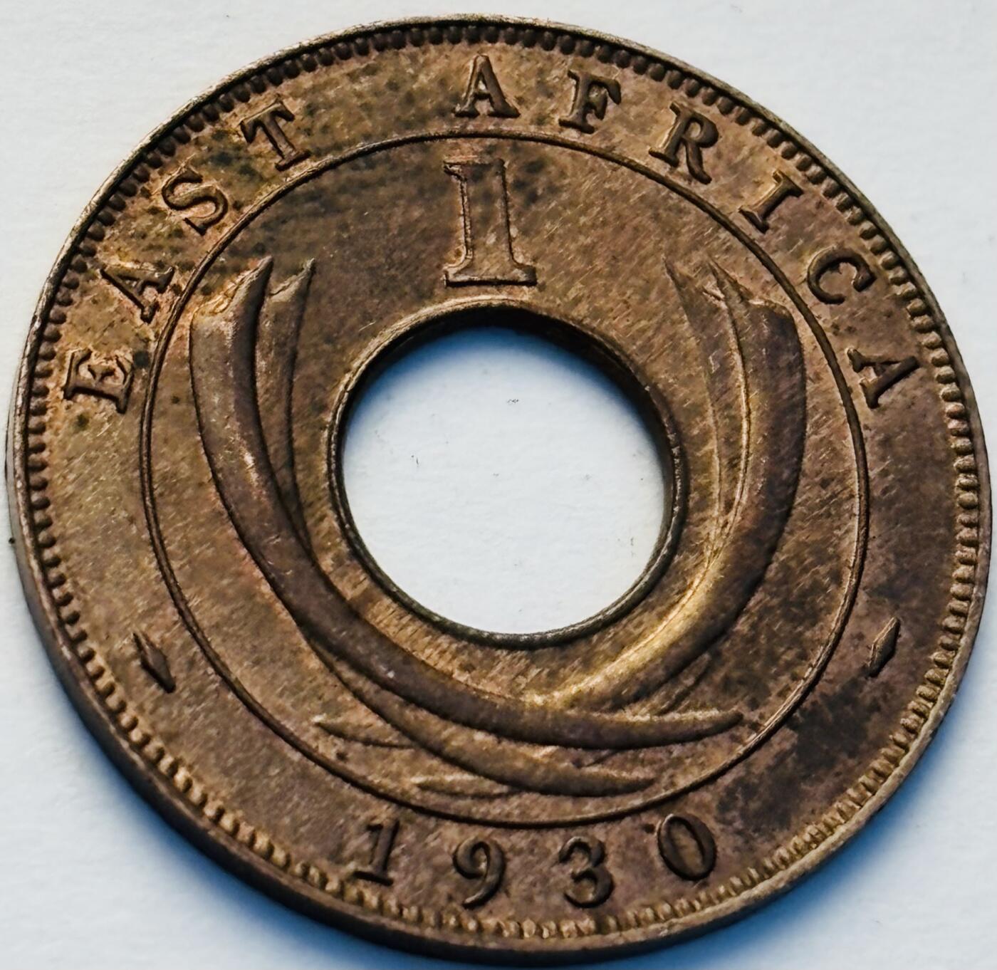 文馨钱币收藏第 242 场，各国古铜币，英系场 少见带原铜光极美品 1930 年英属东非乔治五世中孔 1 分古铜币