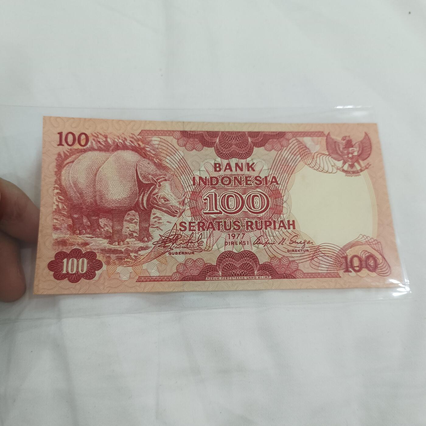 泡泡币外币第三十二场可代拍15038385335微信 印尼100卢比