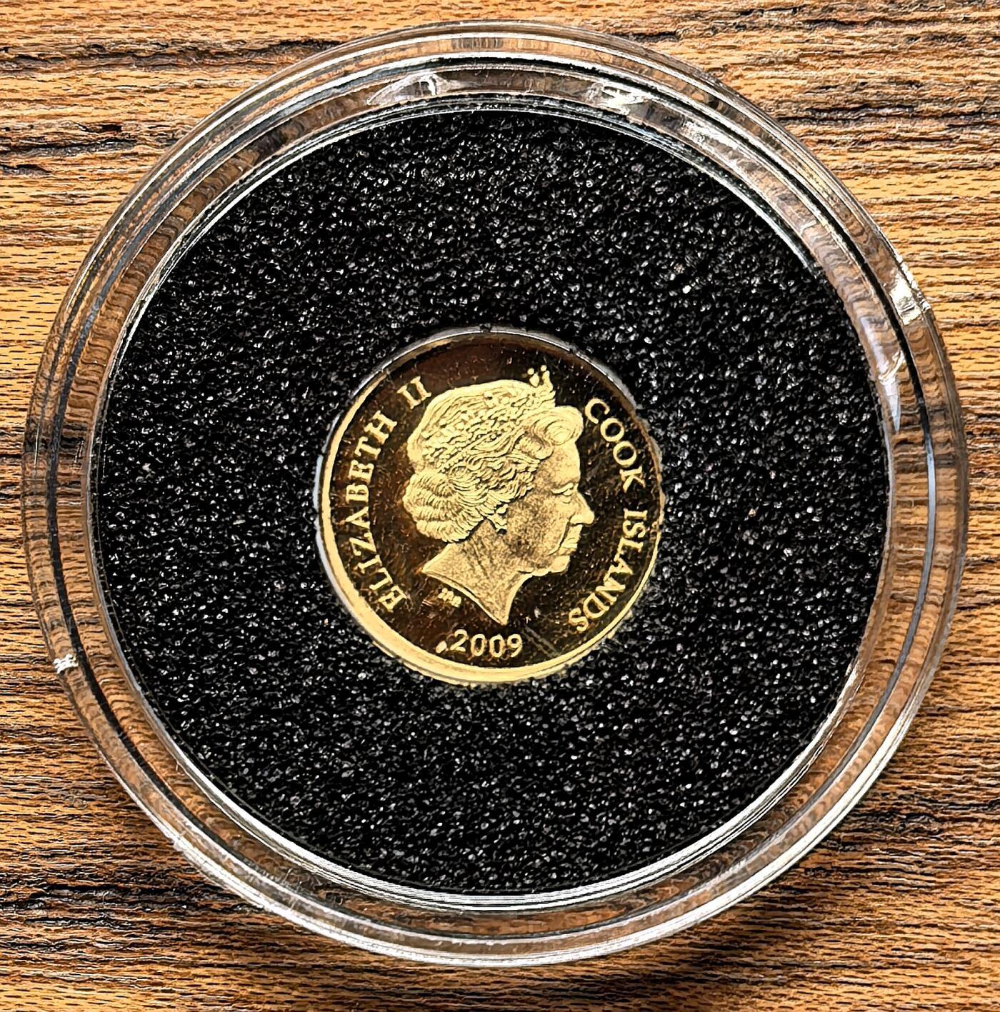 凡希社世界钱币微拍第三百零三期 2009库克群岛太阳神5元小金币全品，0.5g，999金