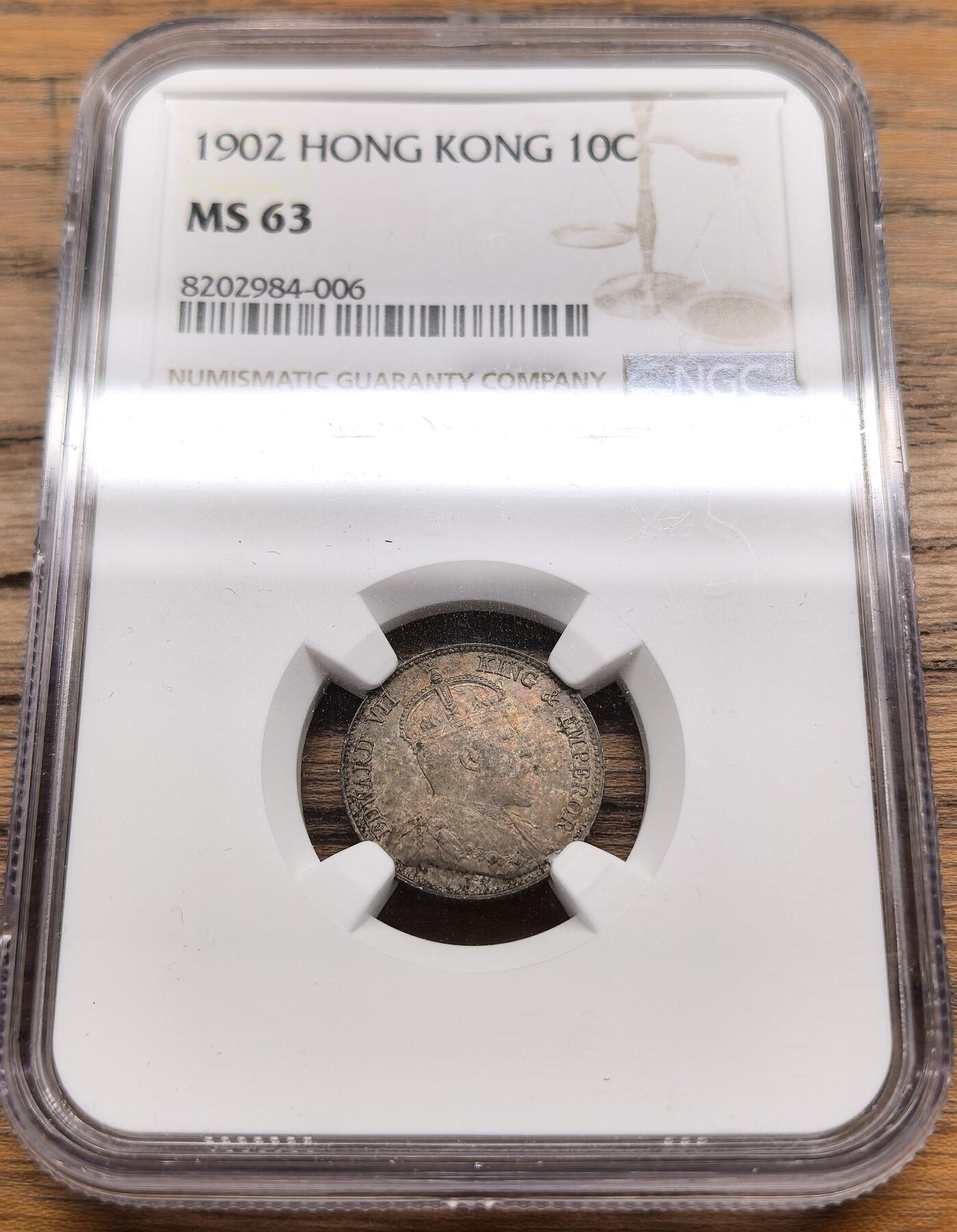 凡希社世界钱币微拍第三百零三期 1902香港爱七壹毫银币NGC-MS63，深色五彩。