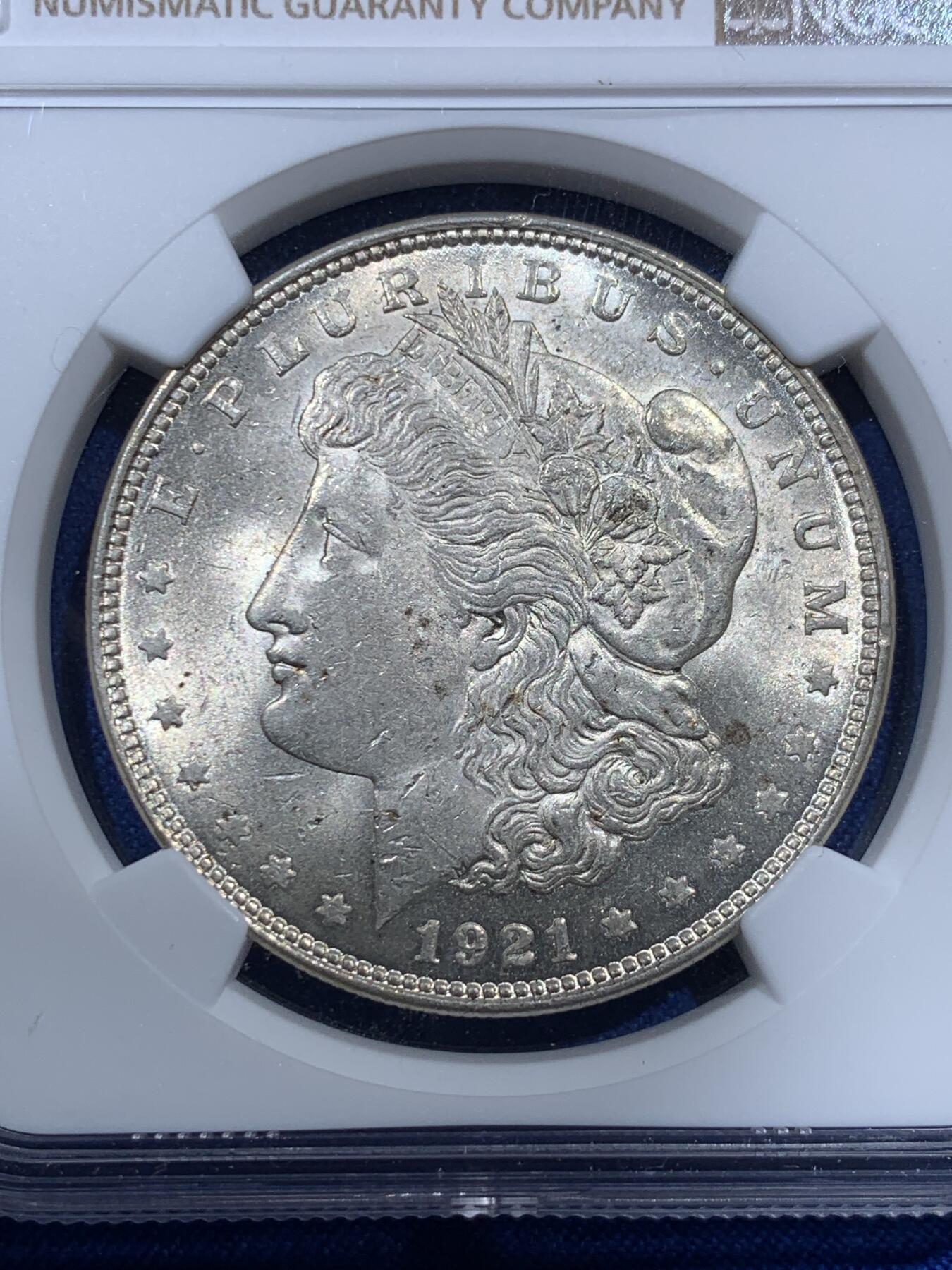 《竞宝斋》第380场 周日，周一 2场连拍 （全场包邮） NGC MS64 美国1921年摩根银币，淡黄油转光，好状态。