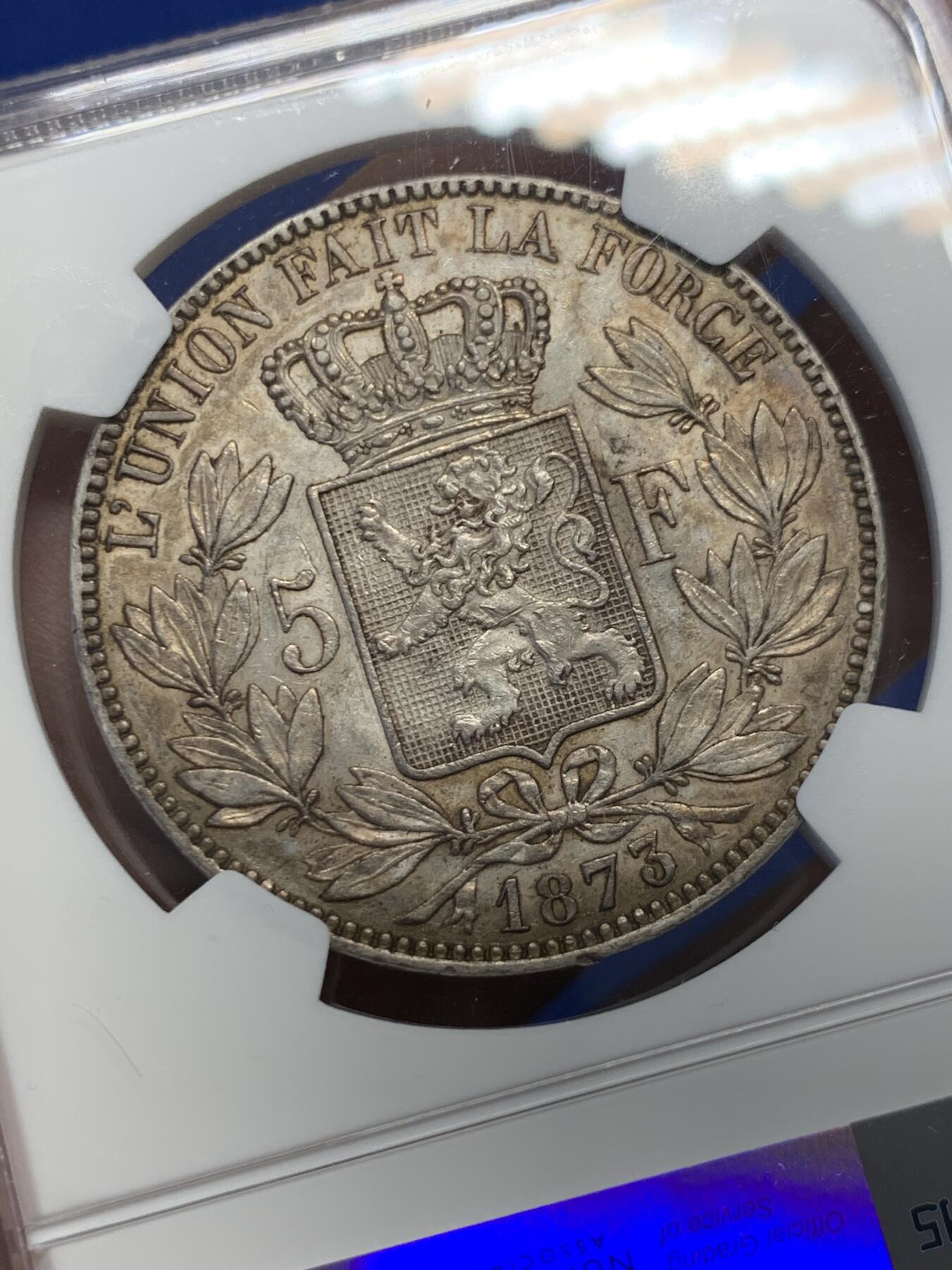 《竞宝斋》第380场 周日，周一 2场连拍 （全场包邮） NGC AU53 比利时1873年利奥波德二世5法郎银币 低评 58分的状态