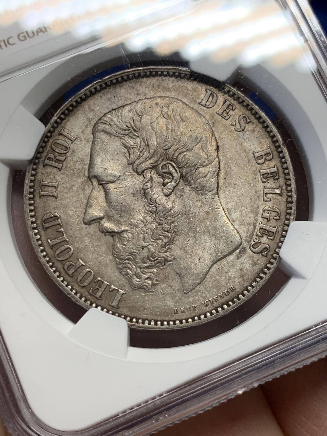 《竞宝斋》第380场 周日，周一 2场连拍 （全场包邮） NGC AU53 比利时1873年利奥波德二世5法郎银币 低评 58分的状态