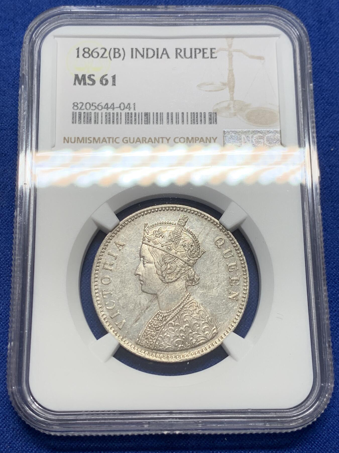 《竞宝斋》第380场 周日，周一 2场连拍 （全场包邮） NGC MS61 英属印度1862年1卢比银币 维多利亚女王皇冠头像首年份 B版孟买厂 0/5dot少见版别 底部5个点