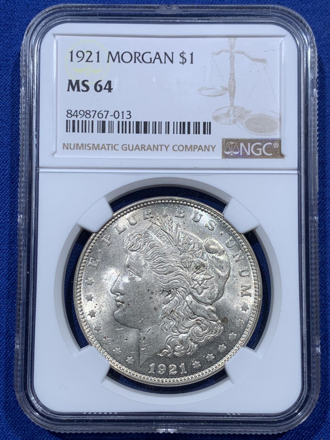《竞宝斋》第380场 周日，周一 2场连拍 （全场包邮） NGC MS64 美国1921年摩根银币，淡黄油转光，好状态。