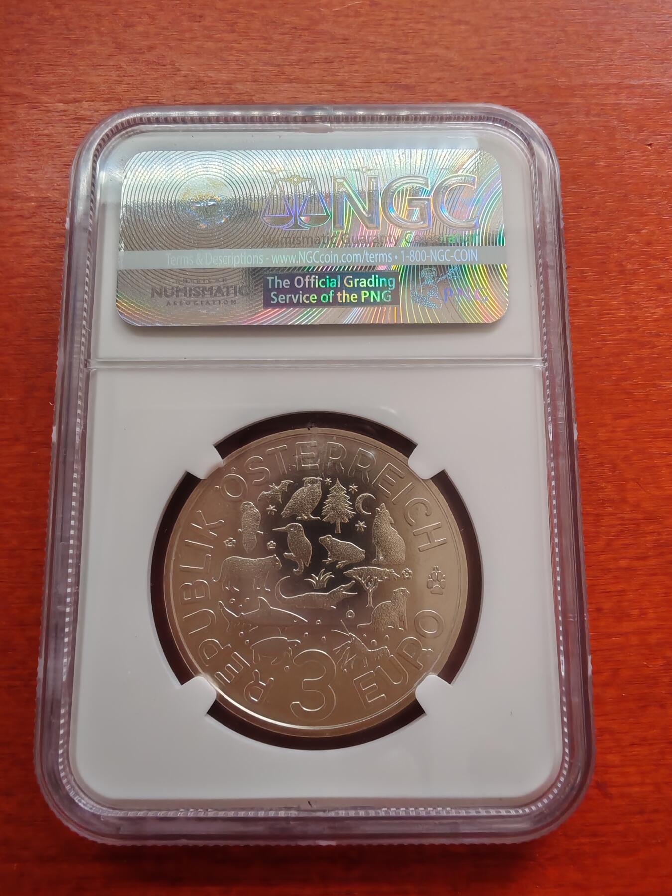长老汇蛇年精选第十场拍卖 2018奥地利鹦鹉夜光3欧元彩色镍币，NGC MS69