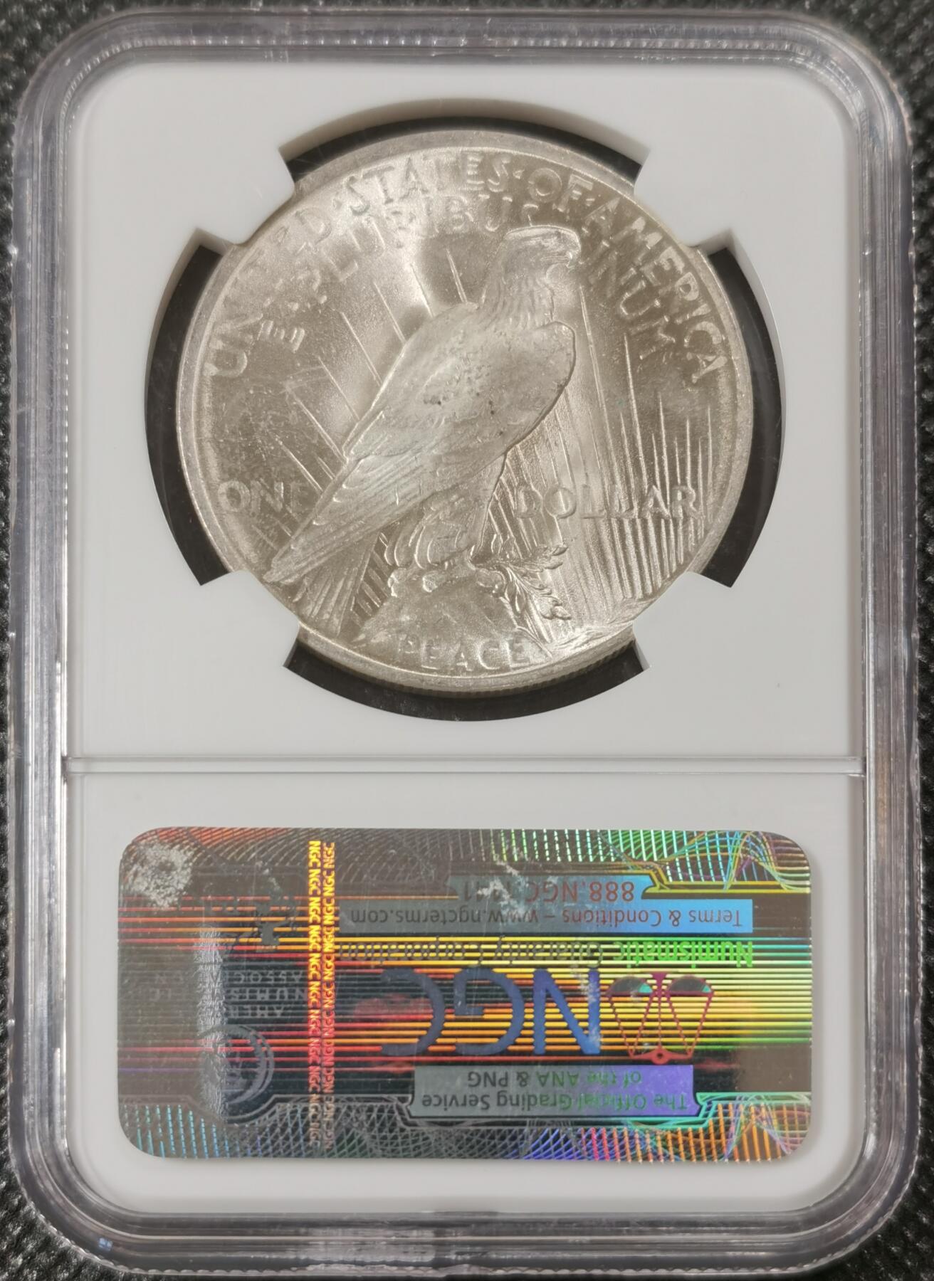  甄臻铺-美国银币专场-世界币章拍卖（第17期），送拍享返佣金等优惠多多 NGC-MS65 1923年美国和平银币，圆润包浆，老盒子，65分的少见