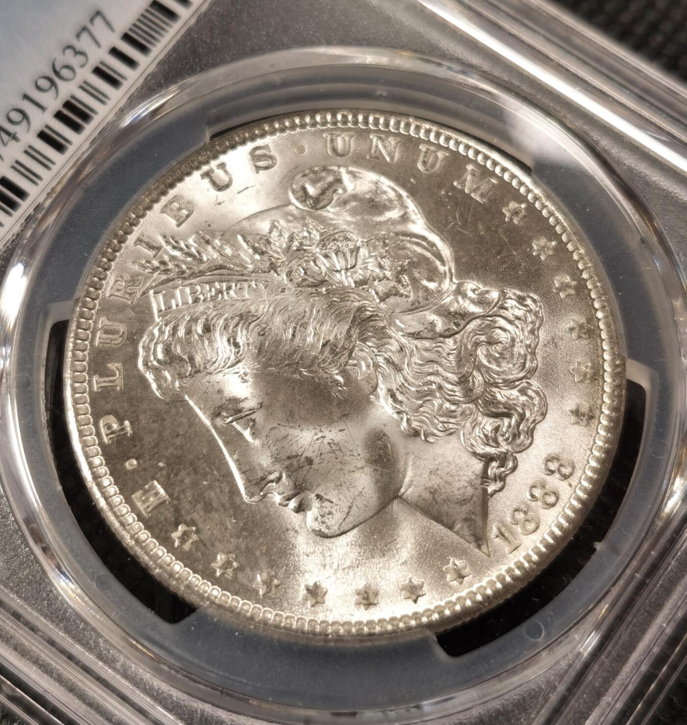  甄臻铺-美国银币专场-世界币章拍卖（第17期），送拍享返佣金等优惠多多 PCGS-MS64 1888年摩根银币，暴力转光，吉祥年份