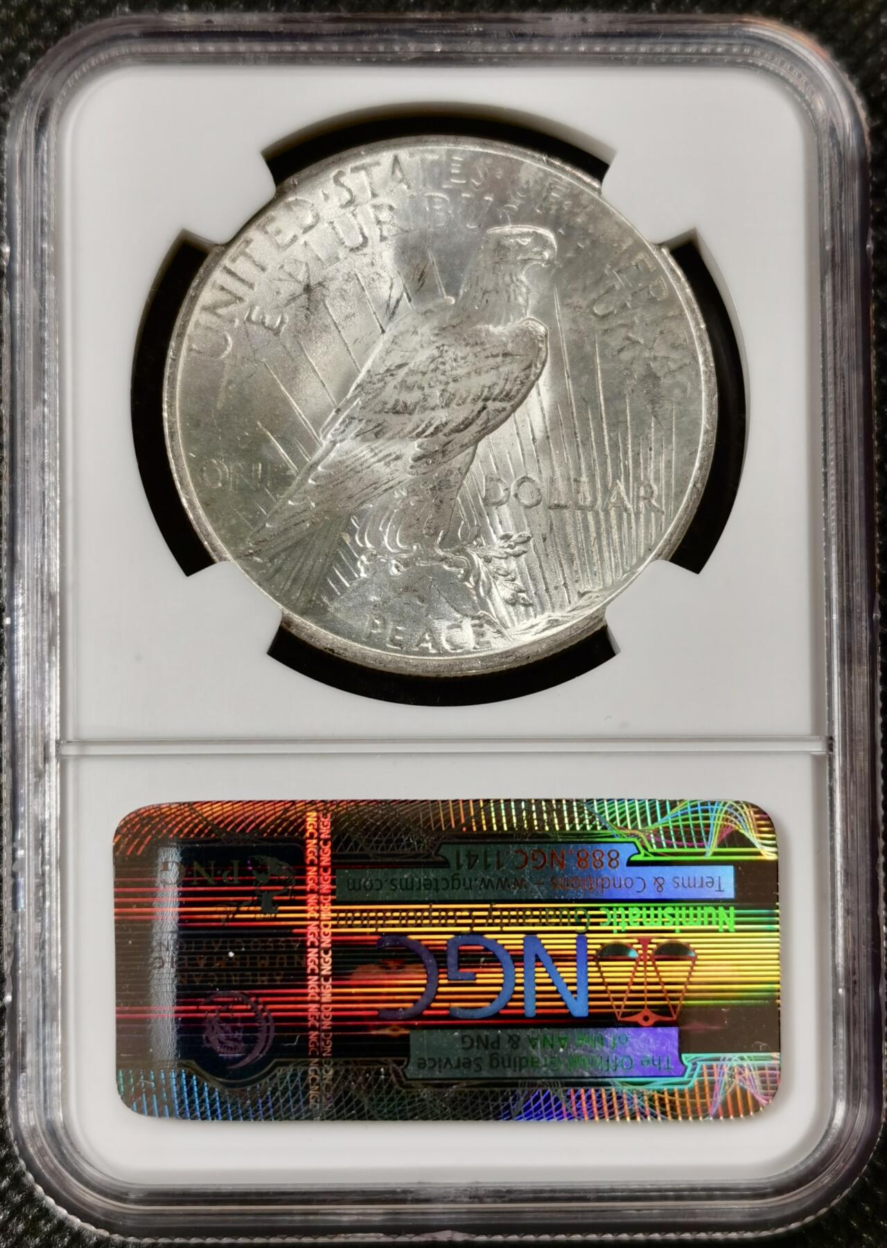  甄臻铺-美国银币专场-世界币章拍卖（第17期），送拍享返佣金等优惠多多 NGC-MS65 1923年美国和平银币，圆润包浆，老盒子，65的不常见