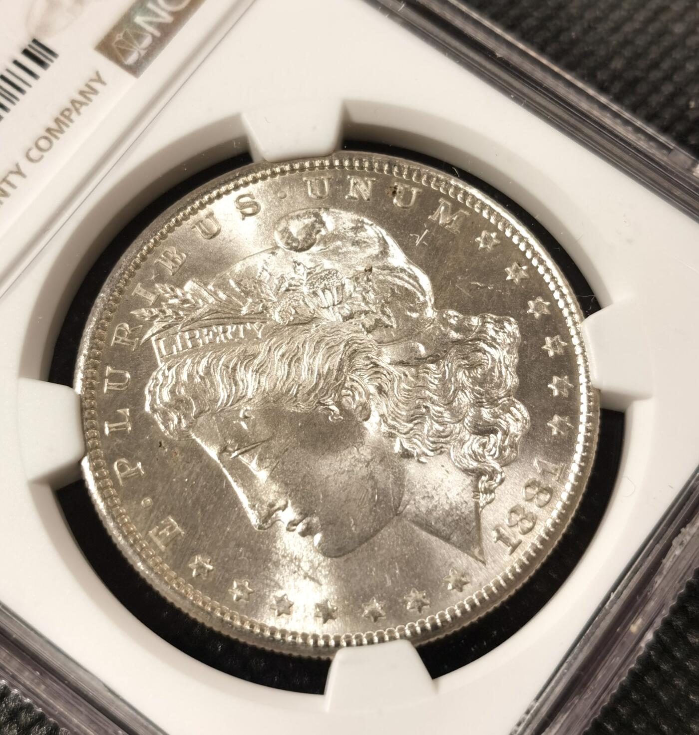  甄臻铺-美国银币专场-世界币章拍卖（第17期），送拍享返佣金等优惠多多 NGC-MS64 1881年S版美国摩根，低评，PL质感