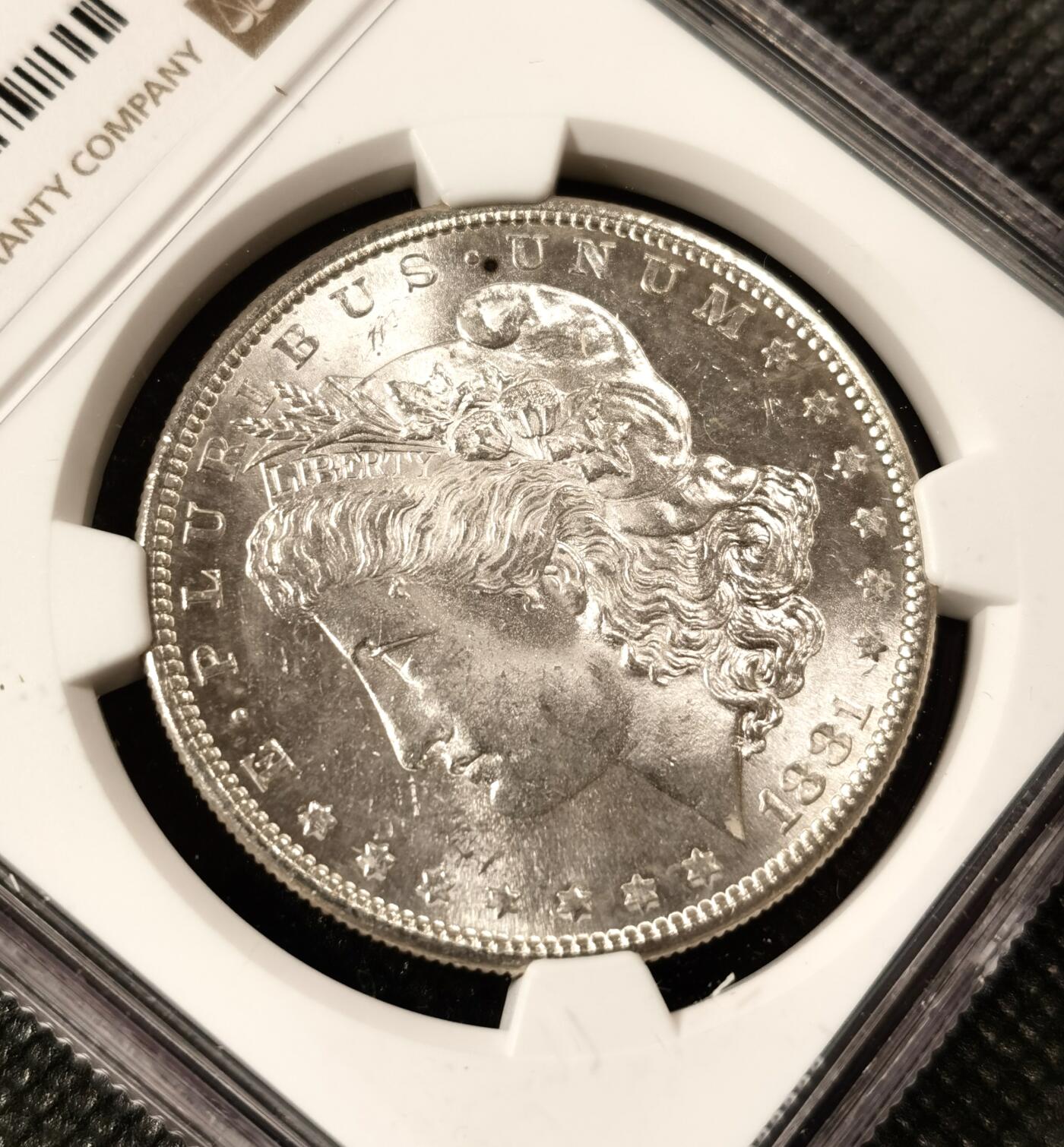  甄臻铺-美国银币专场-世界币章拍卖（第17期），送拍享返佣金等优惠多多 NGC-MS63 1881年S版摩根，镜面质感，目测低评