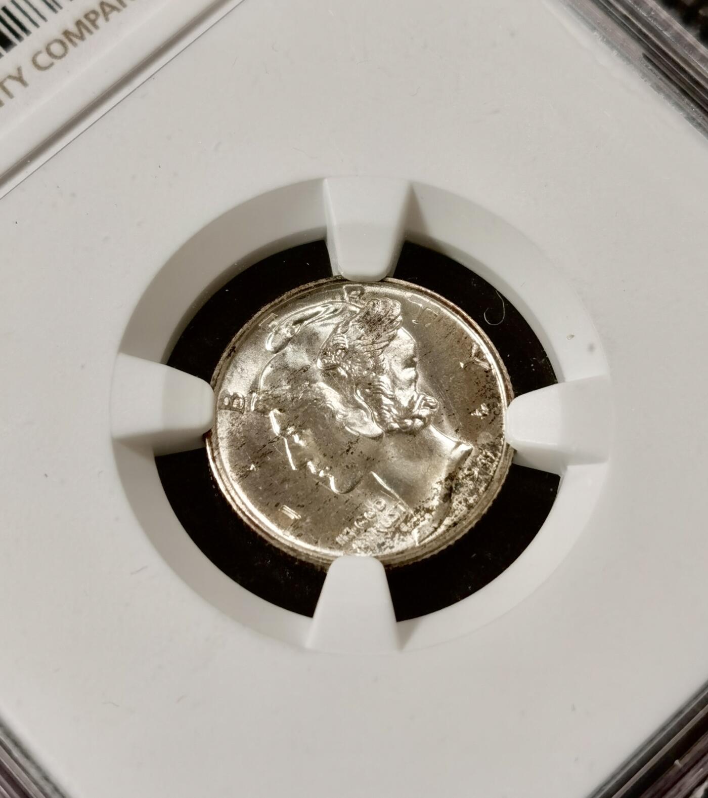  甄臻铺-美国银币专场-世界币章拍卖（第17期），送拍享返佣金等优惠多多 NGC-MS65 1941年S版美国小飞侠，自然包浆