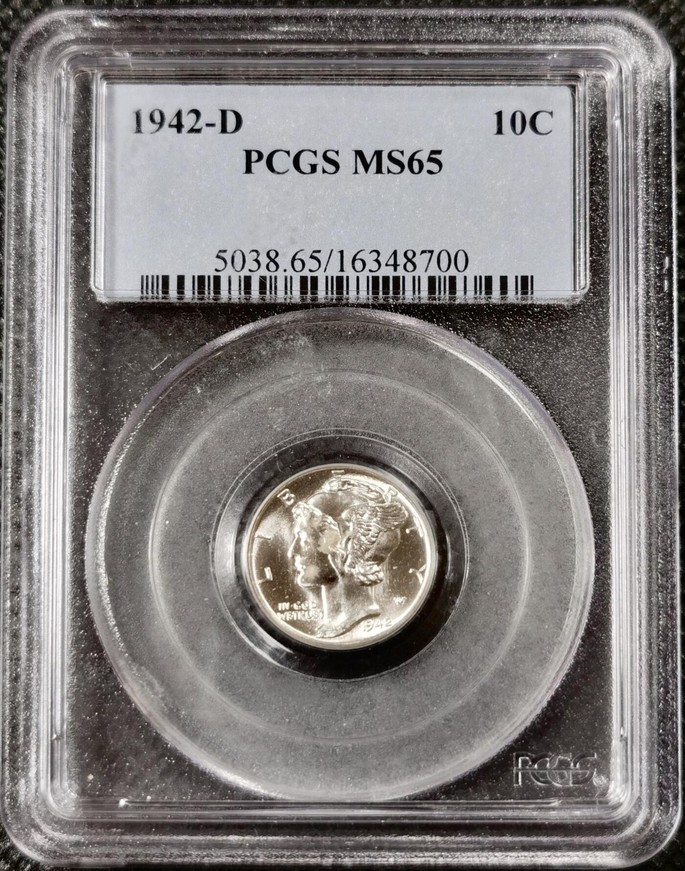  甄臻铺-美国银币专场-世界币章拍卖（第17期），送拍享返佣金等优惠多多 PCGS-MS65 1942年D版小飞侠，流水转光，老盒子严评