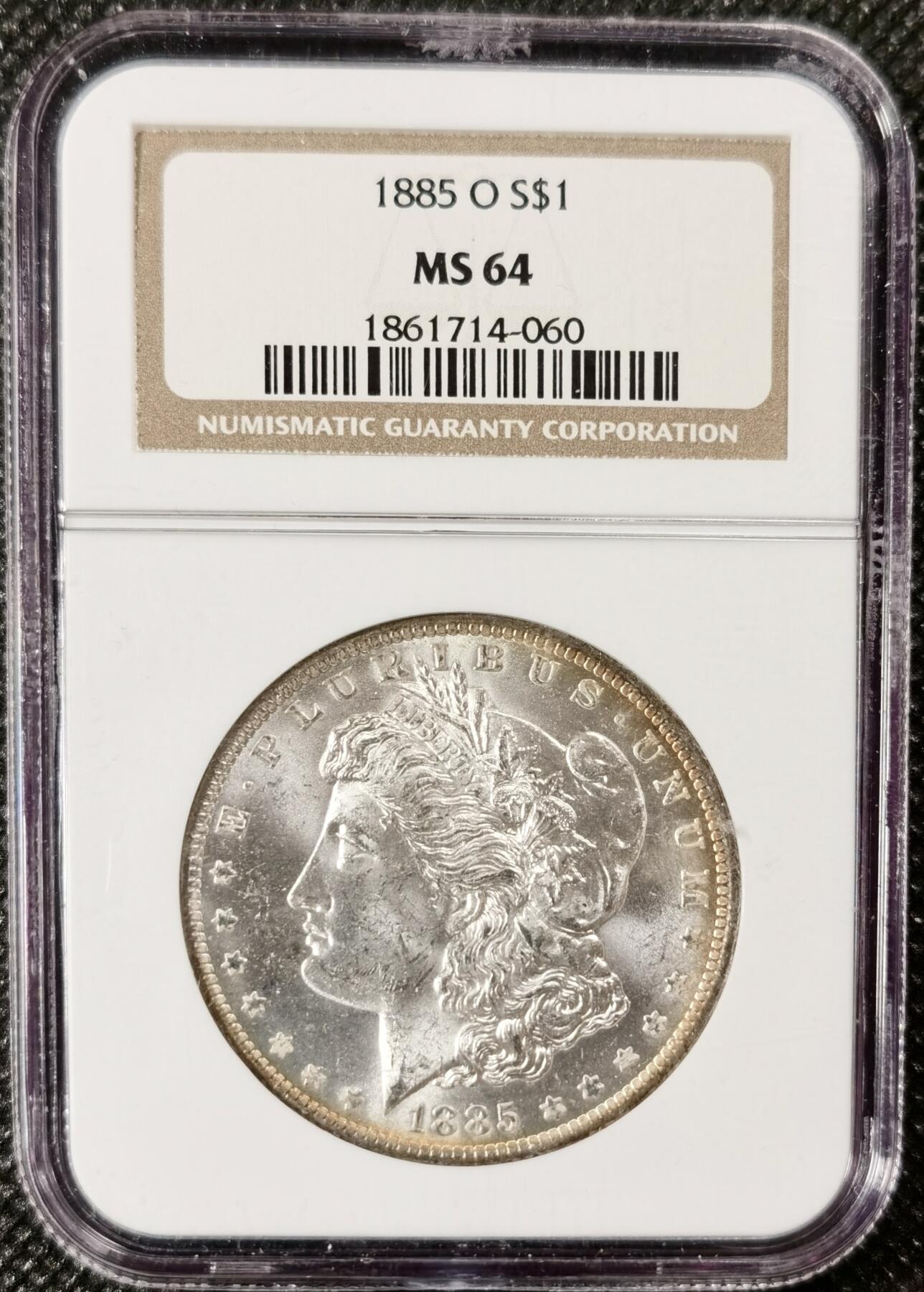  甄臻铺-美国银币专场-世界币章拍卖（第17期），送拍享返佣金等优惠多多 NGC-MS64 1885年O版摩根，淡淡环彩包浆