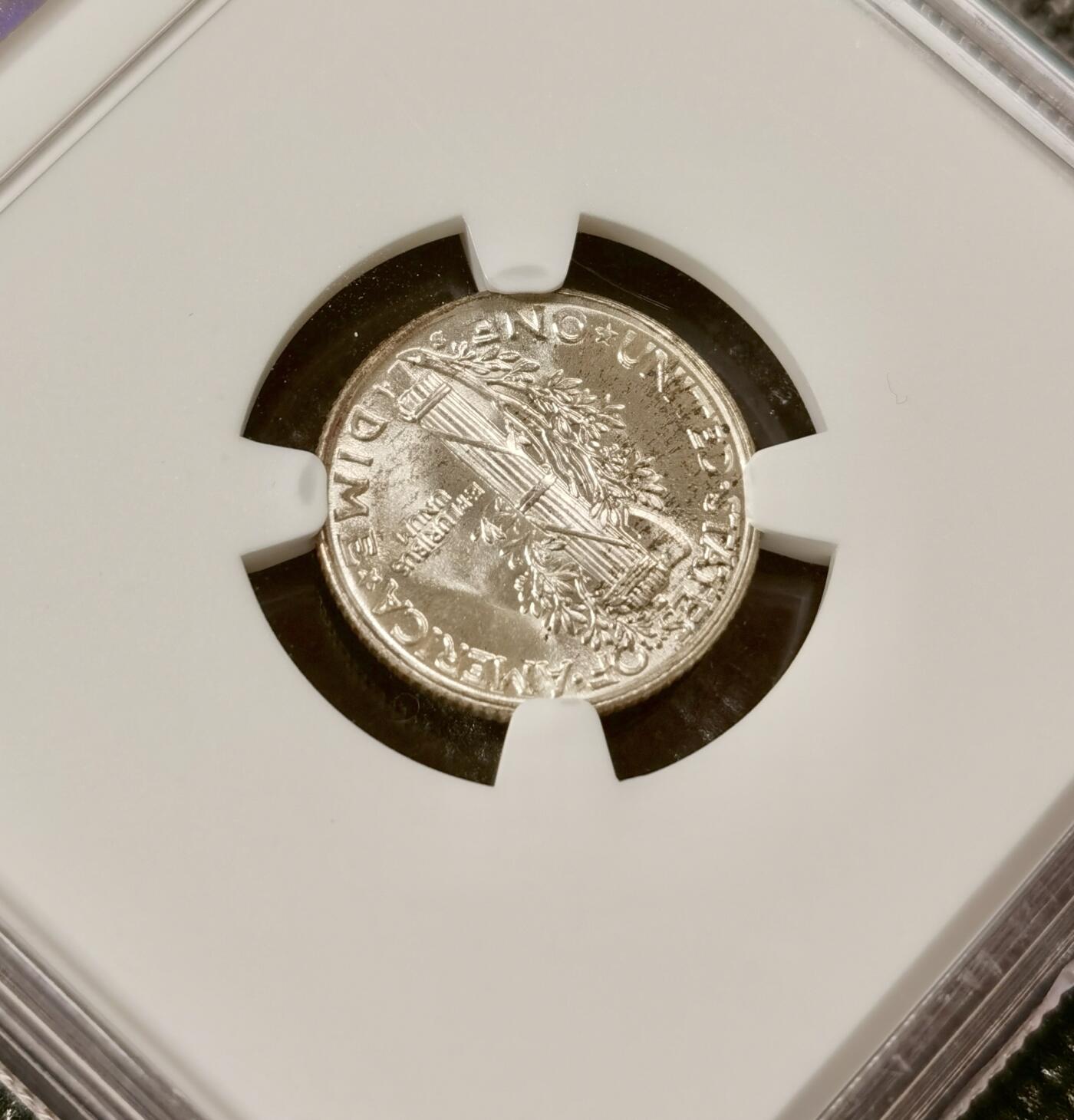  甄臻铺-美国银币专场-世界币章拍卖（第17期），送拍享返佣金等优惠多多 NGC-MS65 1941年S版美国小飞侠，自然包浆