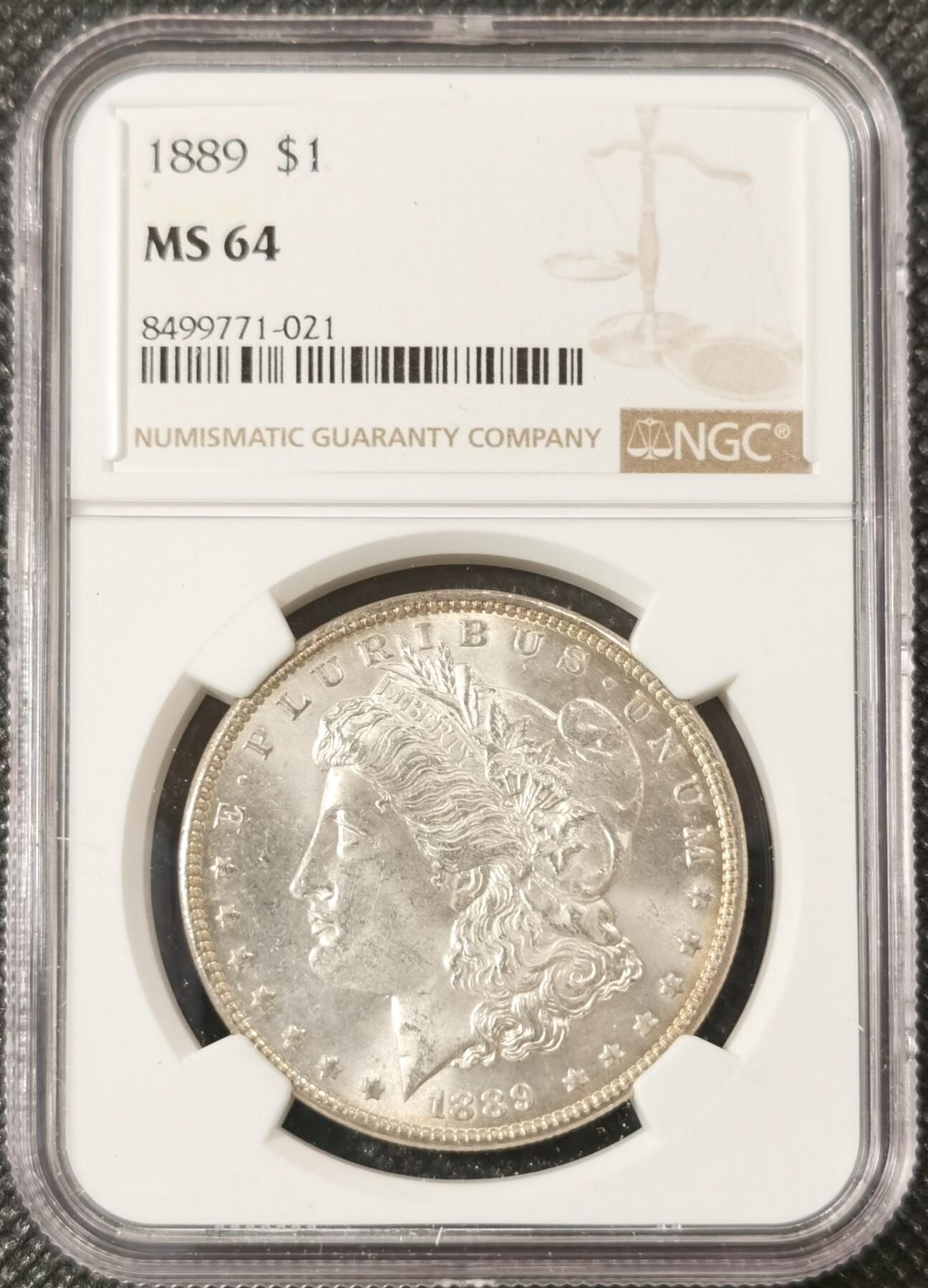  甄臻铺-美国银币专场-世界币章拍卖（第17期），送拍享返佣金等优惠多多 NGC-MS64 1889年美国摩根，淡淡环彩