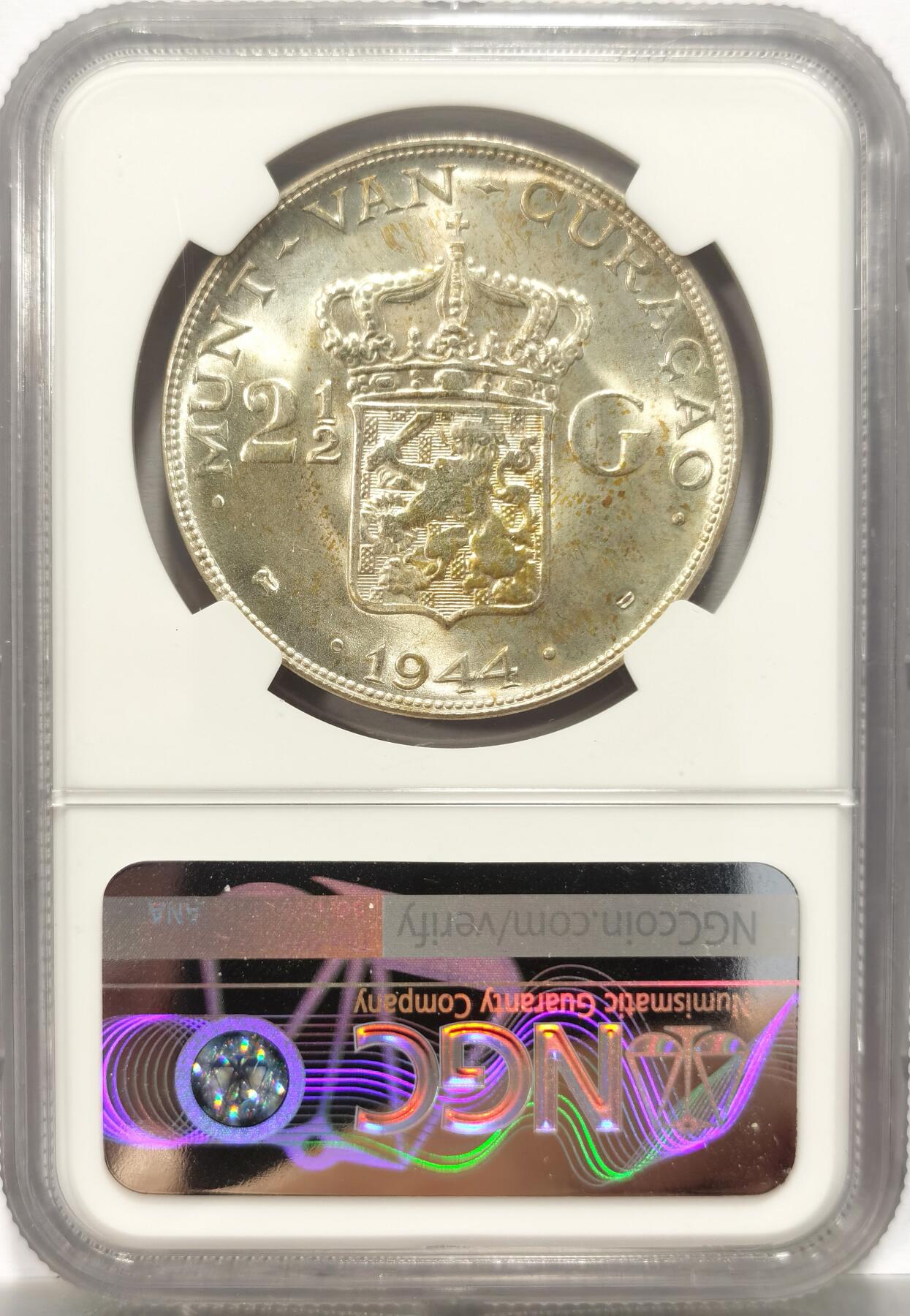 博洋堂世界钱币拍卖第123期（全场包邮） 1944年荷属库拉索威廉明娜2.5盾大银币NGC-MS64，原汁原味老包浆，包浆醇厚润泽又犀利，状态极佳。