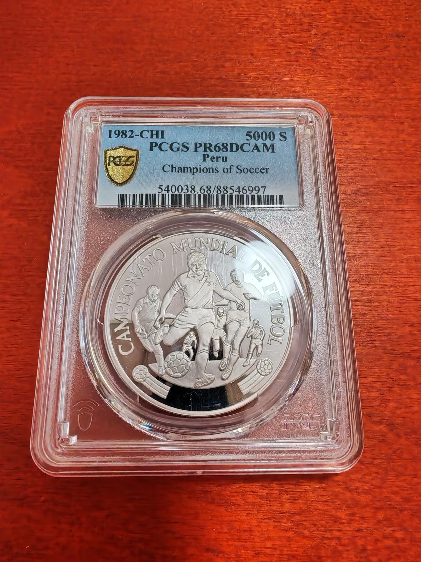 长老汇蛇年精选第十二场拍卖 1982秘鲁世界杯5000索尔精制银币，PCGS PR68DCAM，冠军分，2021同分成交价886元