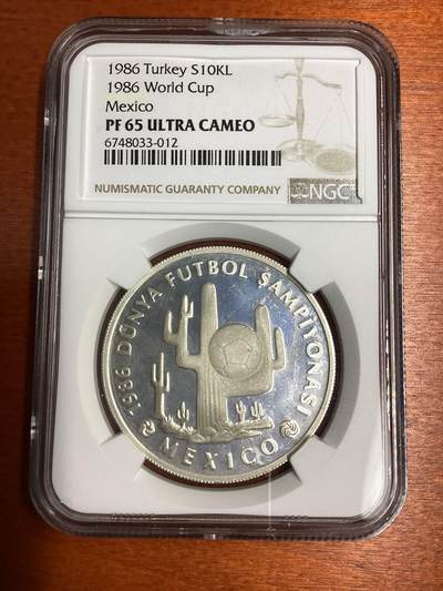 长老汇蛇年精选第十二场拍卖 1986 土耳其墨西哥世界杯1万里拉精制银币，NGC PF65UC，唯一亚军分，更高分仅有两枚
