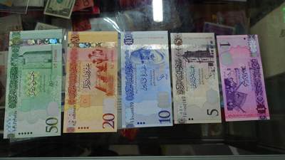 【世界钱币】微拍第179期暨2025年第18期  少量新品上架 利比亚1/5/10/20/50全套 全新绝品