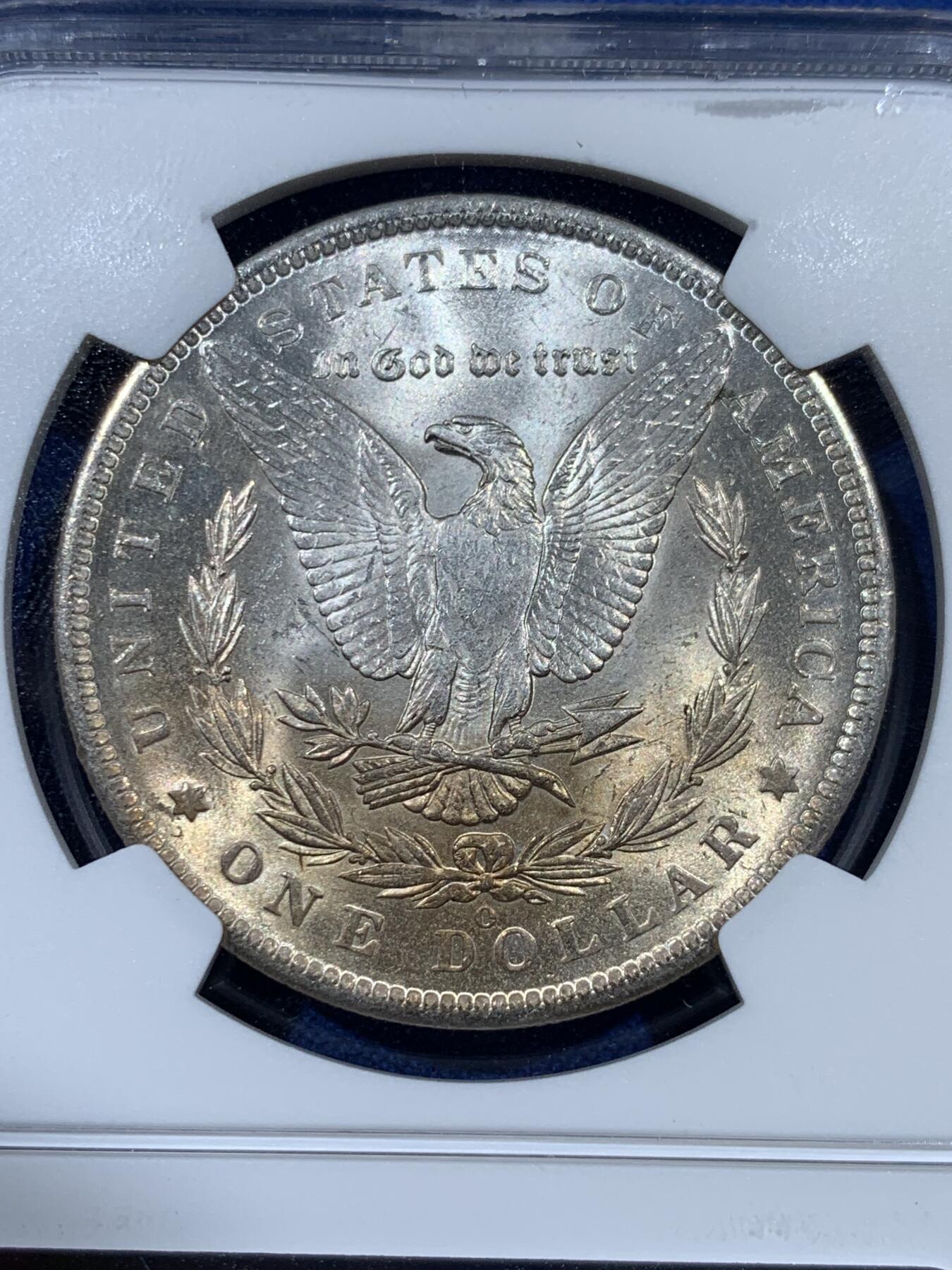 《竞宝斋》第383场 周日，周一，周二 3场连拍 （全场包邮） NGC MS64 美国1885年摩根银币，原光好品，带漂亮淡彩。
