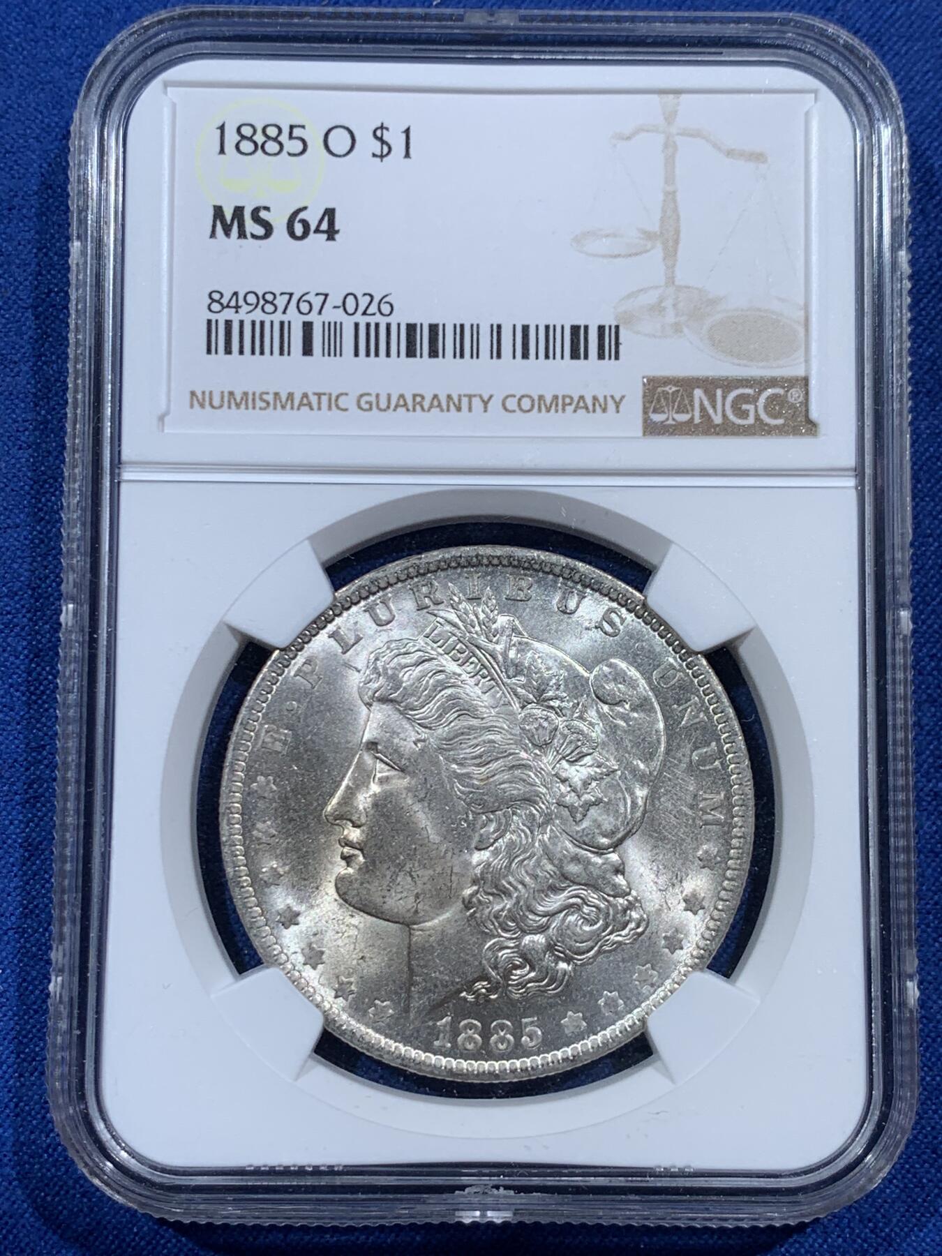 《竞宝斋》第383场 周日，周一，周二 3场连拍 （全场包邮） NGC MS64 美国1885年摩根银币，原光好品，带漂亮淡彩。