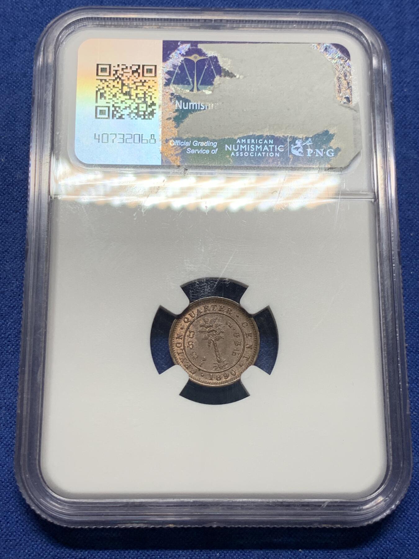 《竞宝斋》第383场 周日，周一，周二 3场连拍 （全场包邮） NGC MS64BN 锡兰（Ceylon）1890年 1/4仙 铜币 维多利亚女王左像，雕刻精致，红棕原色包浆温润。殖民地低面值小铜币，流通剧烈，存世高分尤为罕见。细节完整，静静承载着旧英属锡兰的殖民记忆与热带岛国的岁月余温