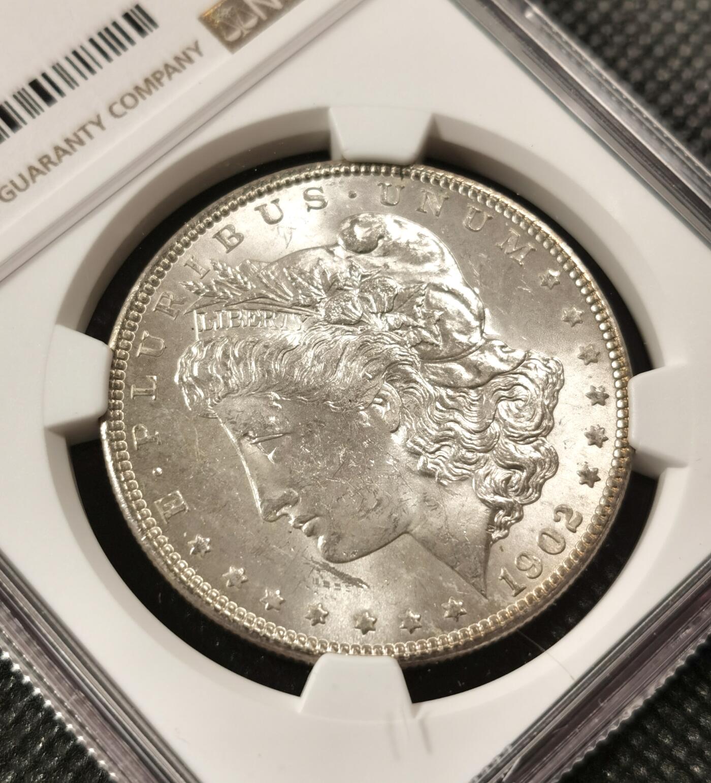  甄臻铺-世界币章拍卖（第19期），送拍享返佣金等优惠多多 NGC-MS62 1902年O版摩根，曝光品相，严重低评