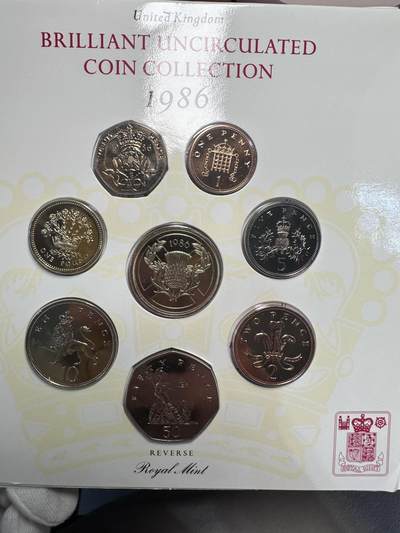 6.6精制币、套币、银币专场 - 1986年英国皇家铸币厂官方纪念币卡册 一套8枚  原装正品  含2英镑（英联邦运动会纪念币）