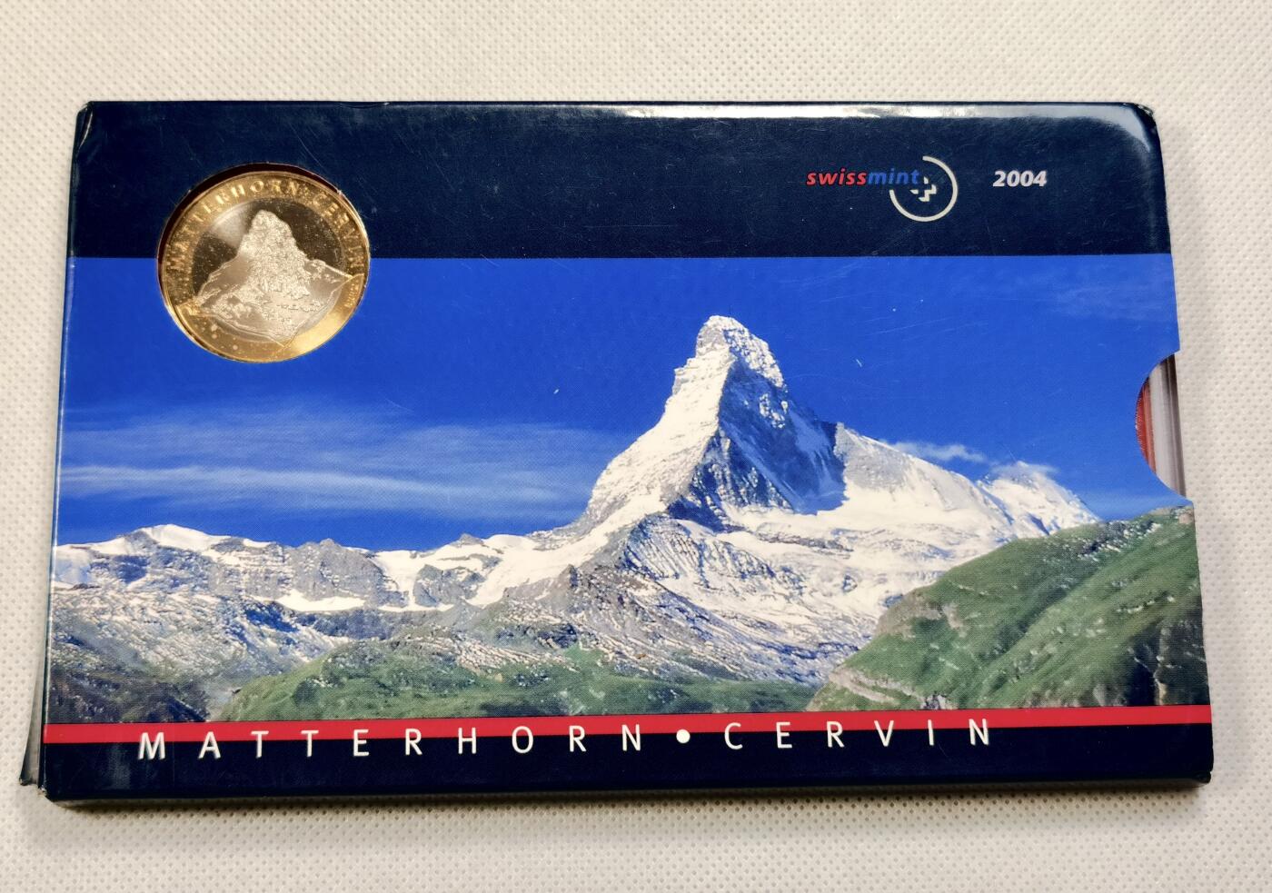  甄臻铺-世界币章拍卖（第20期），送拍享返佣金等优惠多多 2004年 瑞士精制套币 含马特洪峰10瑞士法郎双色纪念币 也是首枚10瑞士法郎硬币