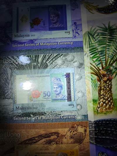 爱陶轩英伦邮币钞章专场 马来西亚2012年全新纪念版票2张一套:货币系列念，面值30马来西亚林吉特