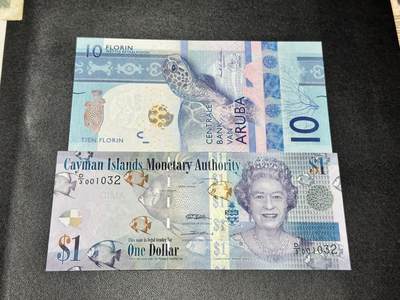 《外钞收藏家》第五百三十六期（本期精选稀少美元评级和众多热门品种）（长期征集拍品、欢迎联系） - 阿鲁巴10 A冠无47尾8 全新+开曼群岛1刀 UNC- 有个接近贯穿的压痕
