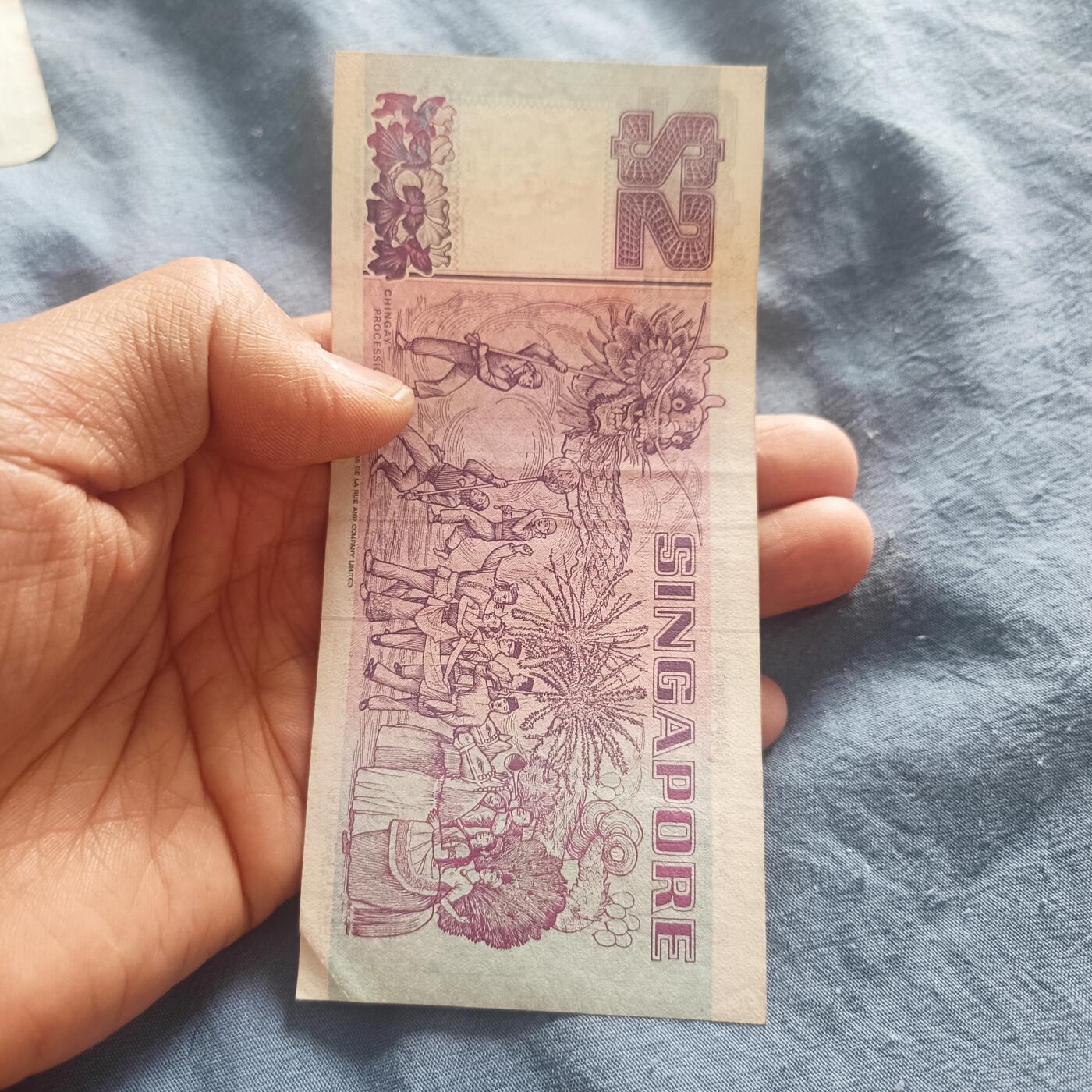 泡泡币外币第五十一场可代拍15038385335微信 新加坡2刀