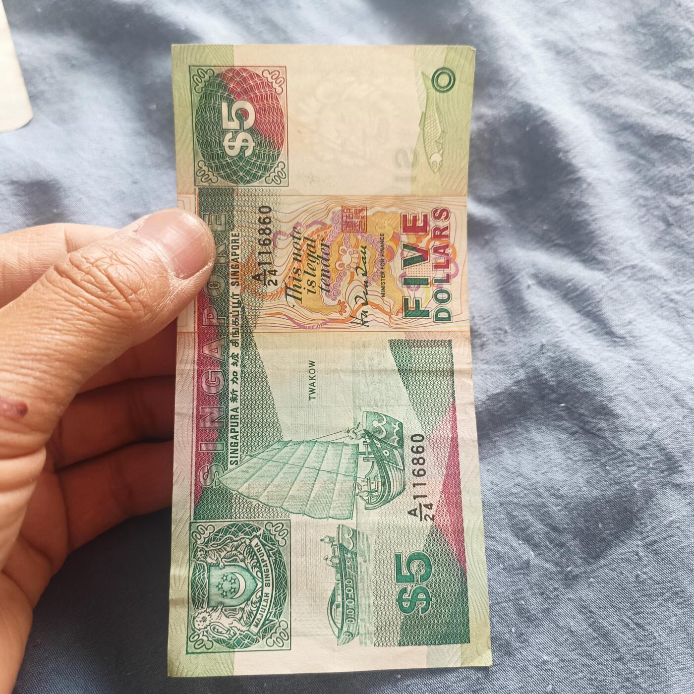 泡泡币外币第五十一场可代拍15038385335微信 新加坡5刀