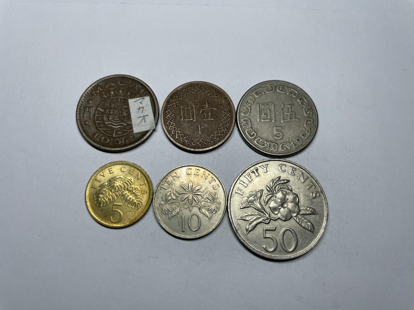 2025年集古藏今外币拍卖第六期-第3场—（总第243拍），可以寄存60天，满160元包邮。 新加坡、澳门等6枚