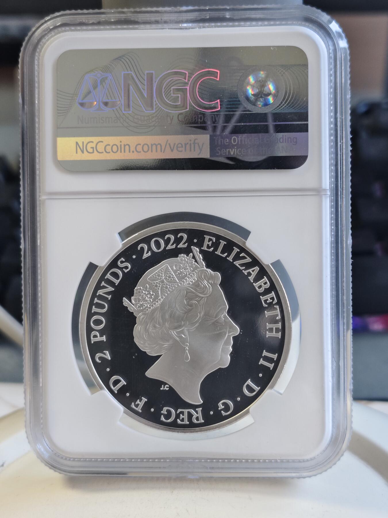 第168期拍卖【长期征集拍品】 英国2022发行哈利波特出版25周年2英镑精制纪念银币NGC-PF69,999银，发行15000枚