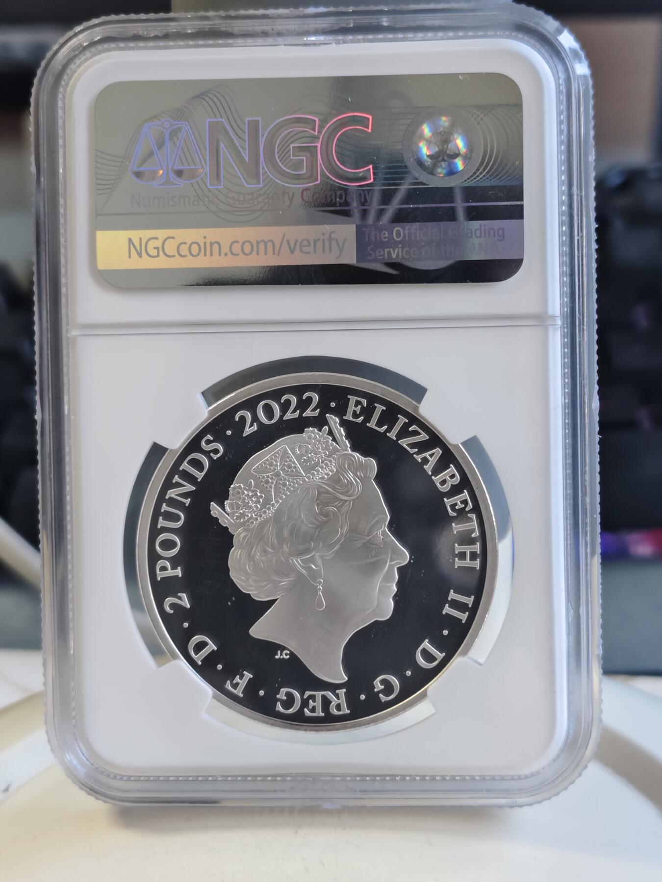 第168期拍卖【长期征集拍品】 英国2022发行哈利波特出版25周年2英镑精制纪念银币NGC-PF69,999银，发行15000枚