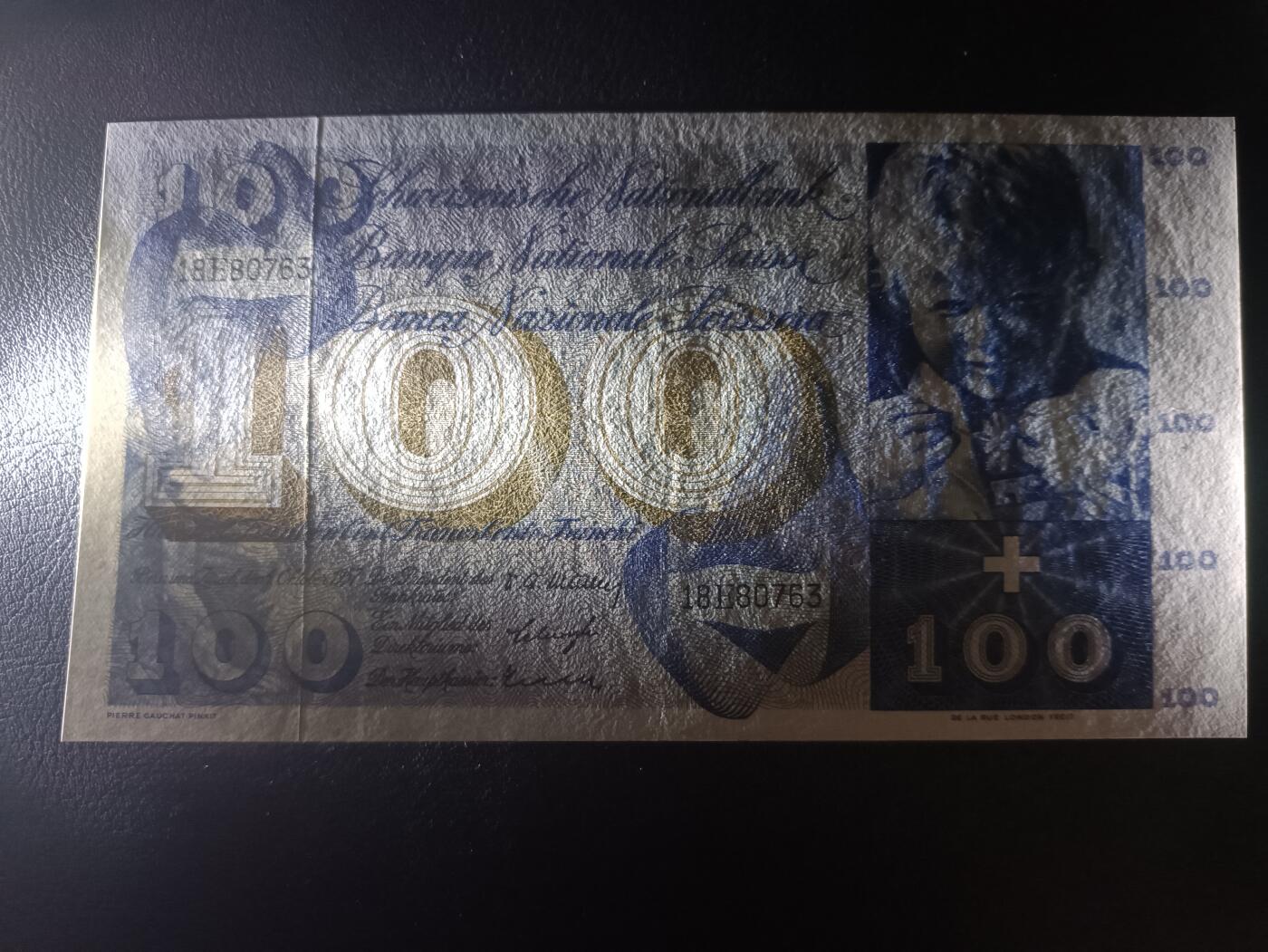 2025六月第五期（总第182期） 瑞士1957年100法郎AUNC，较早期年份，男孩喂羊和马丁割袍的典故