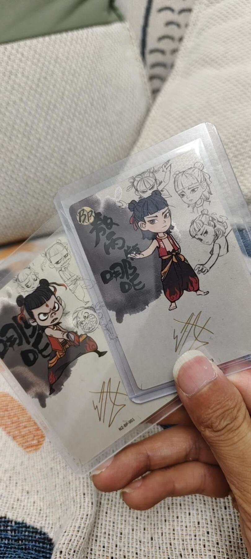 秋原瞳的小店第十六期（火辣辣的夏天，卡游最火哪吒和昆仑万象最火项目激情碰撞） 卡游哪吒bp印签001.003哪吒一对